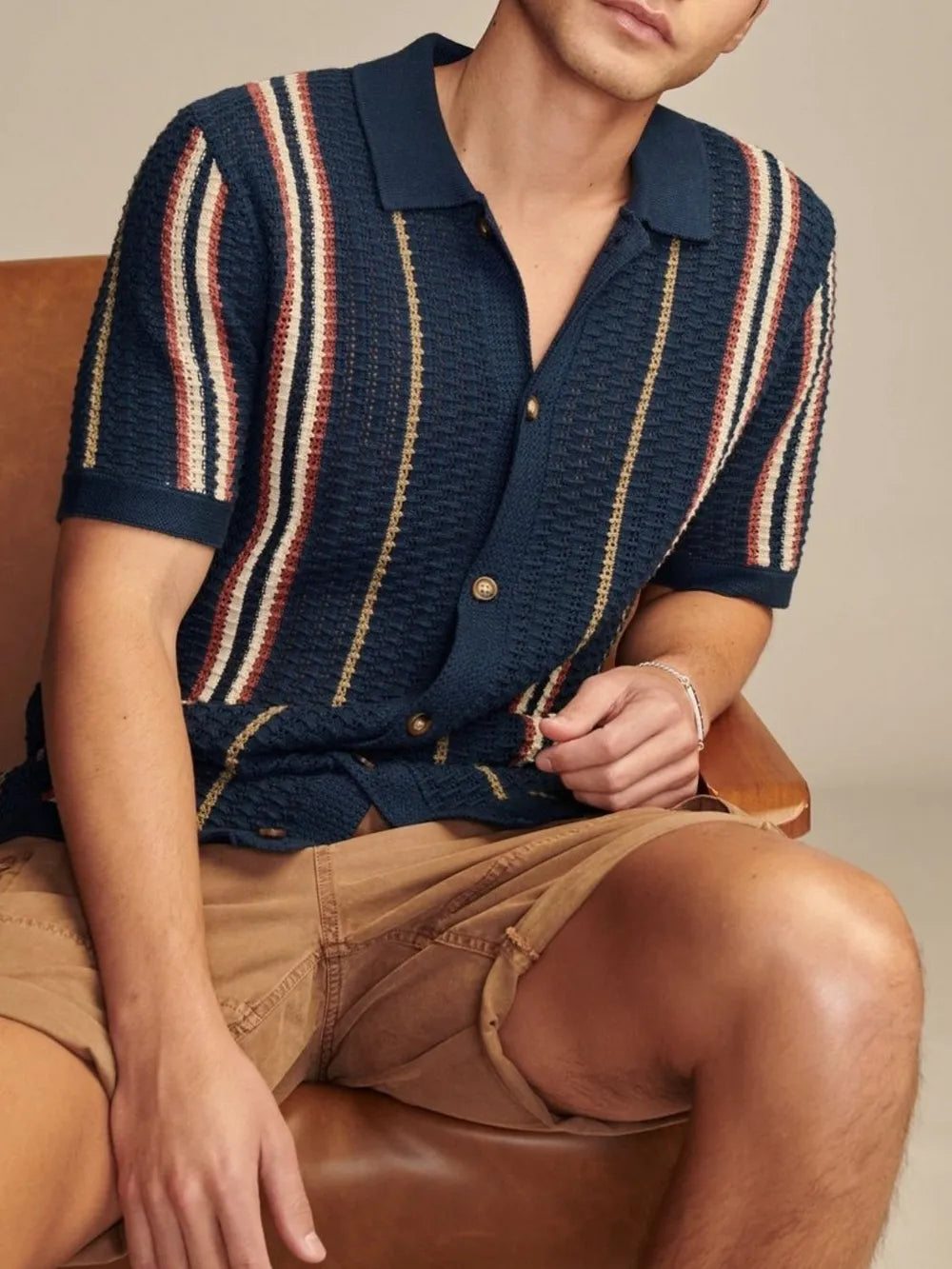 Dark navy striped collared short-sleeve shirt with button detail