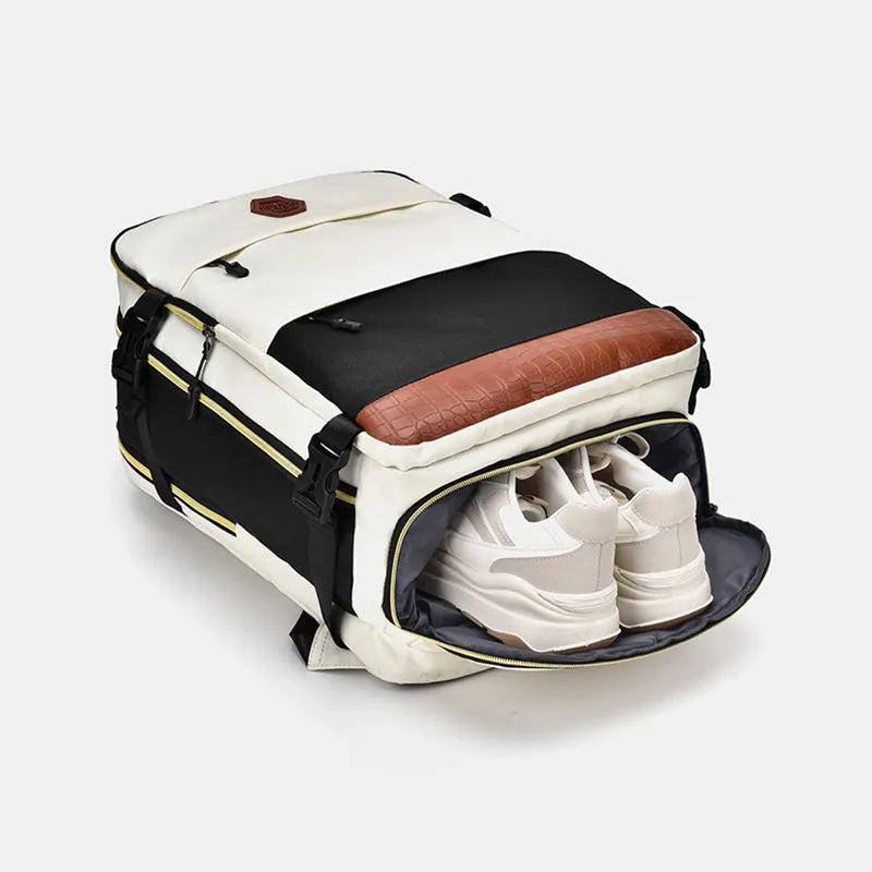 Multi-pocket backpack bag, side view with open front compartment and inner shoe pocket
