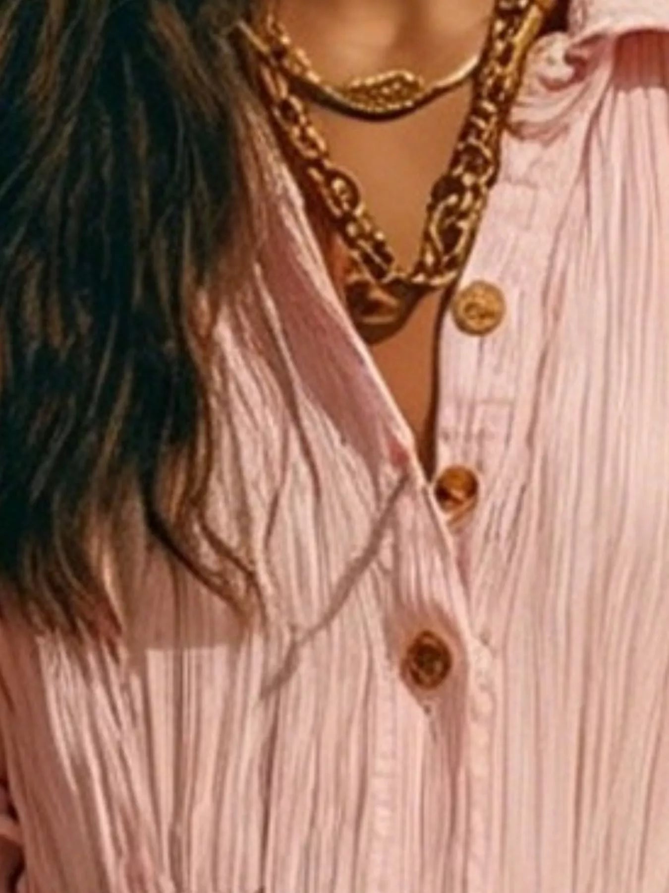 Light pink textured button-front maxi dress detail with gold buttons and gathered waist