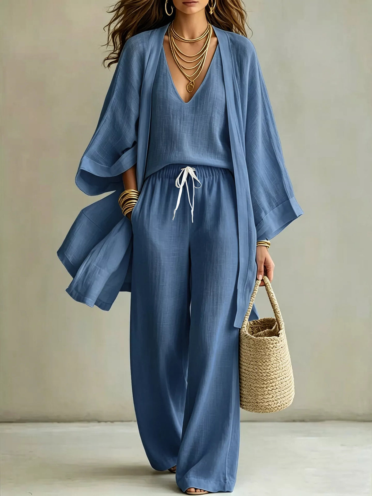 Three-piece outfit set in light blue: V-neck top, drawstring wide-leg pants, open cardigan