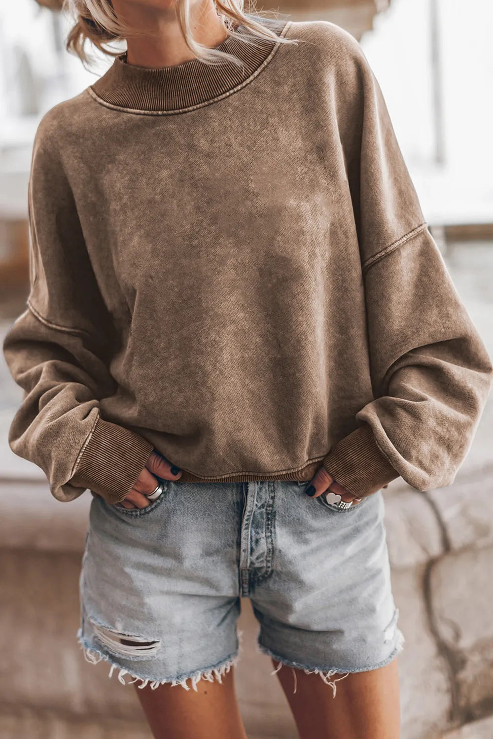 Taupe mock neck sweatshirt with dropped shoulders and ribbed neckline