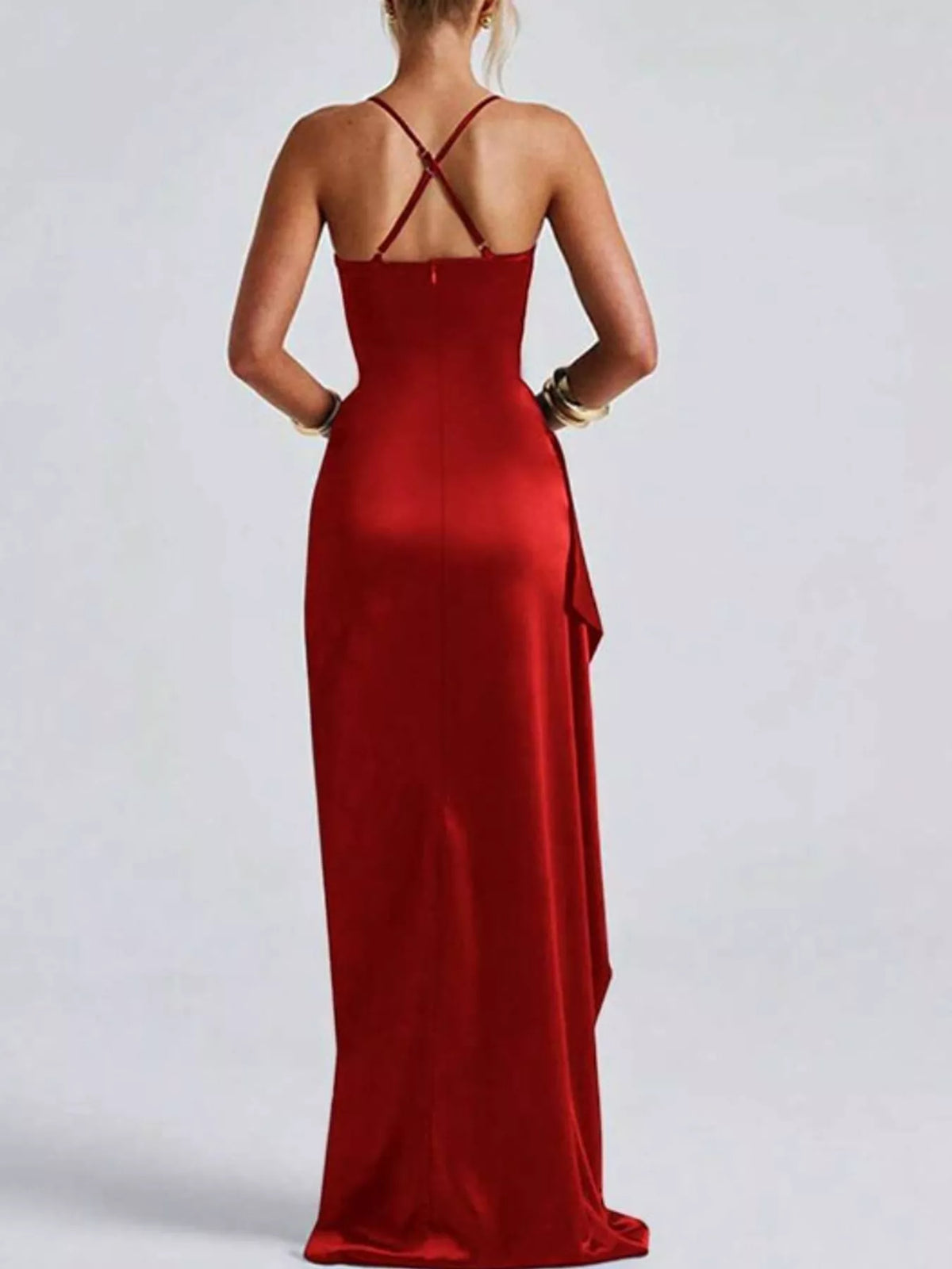 Red satin maxi dress with crisscross back straps and high side slit