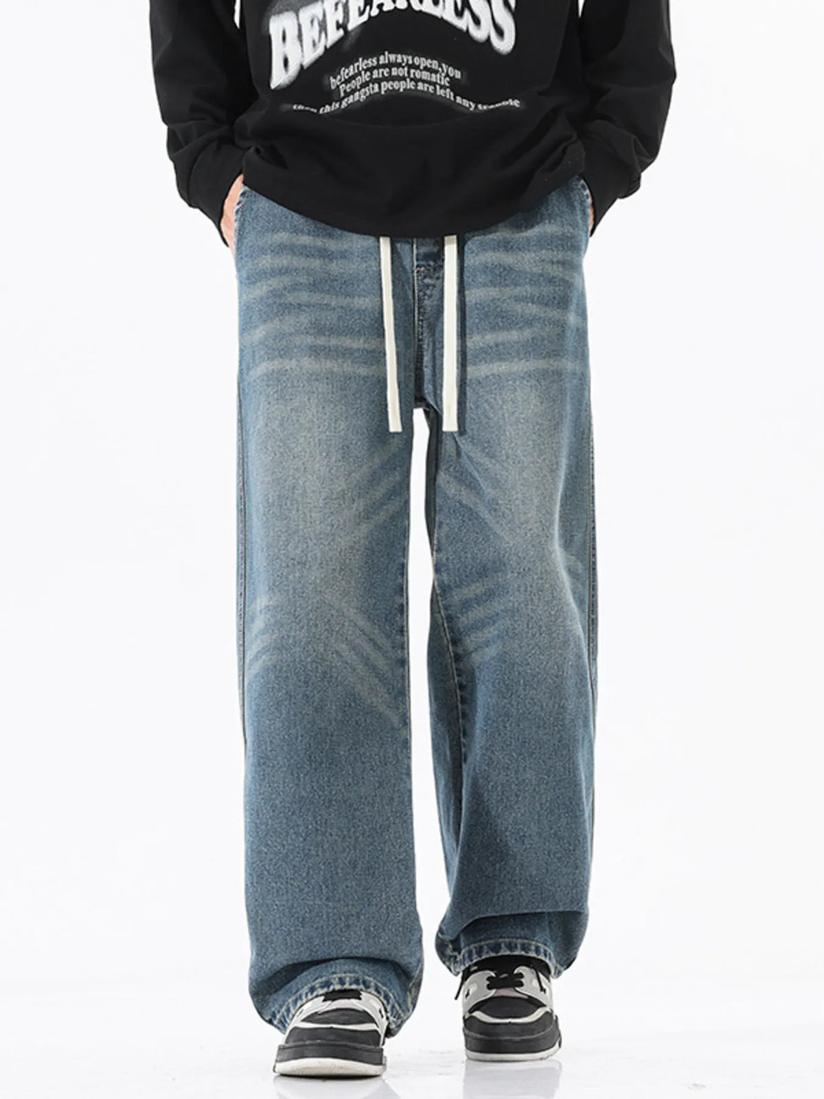 Men's vintage blue wide-leg cotton jeans with drawstring tie waist and cuffed hems