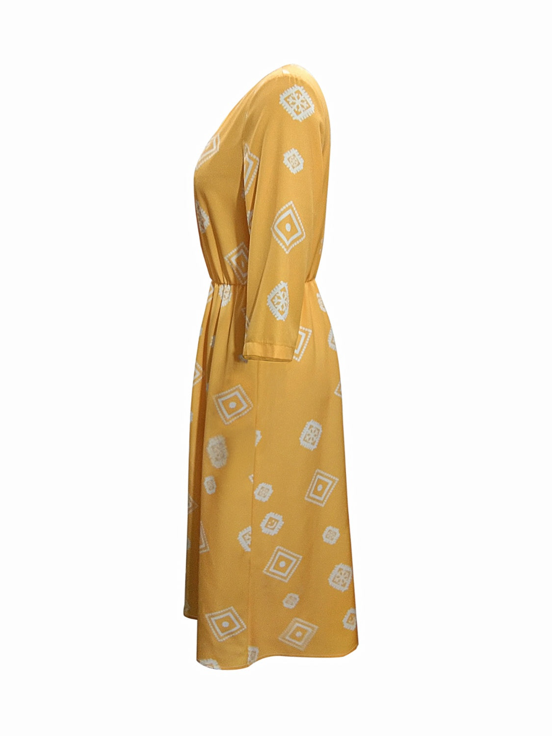 Yellow notched neck dress, side view, white geometric diamond print, 3/4 sleeves