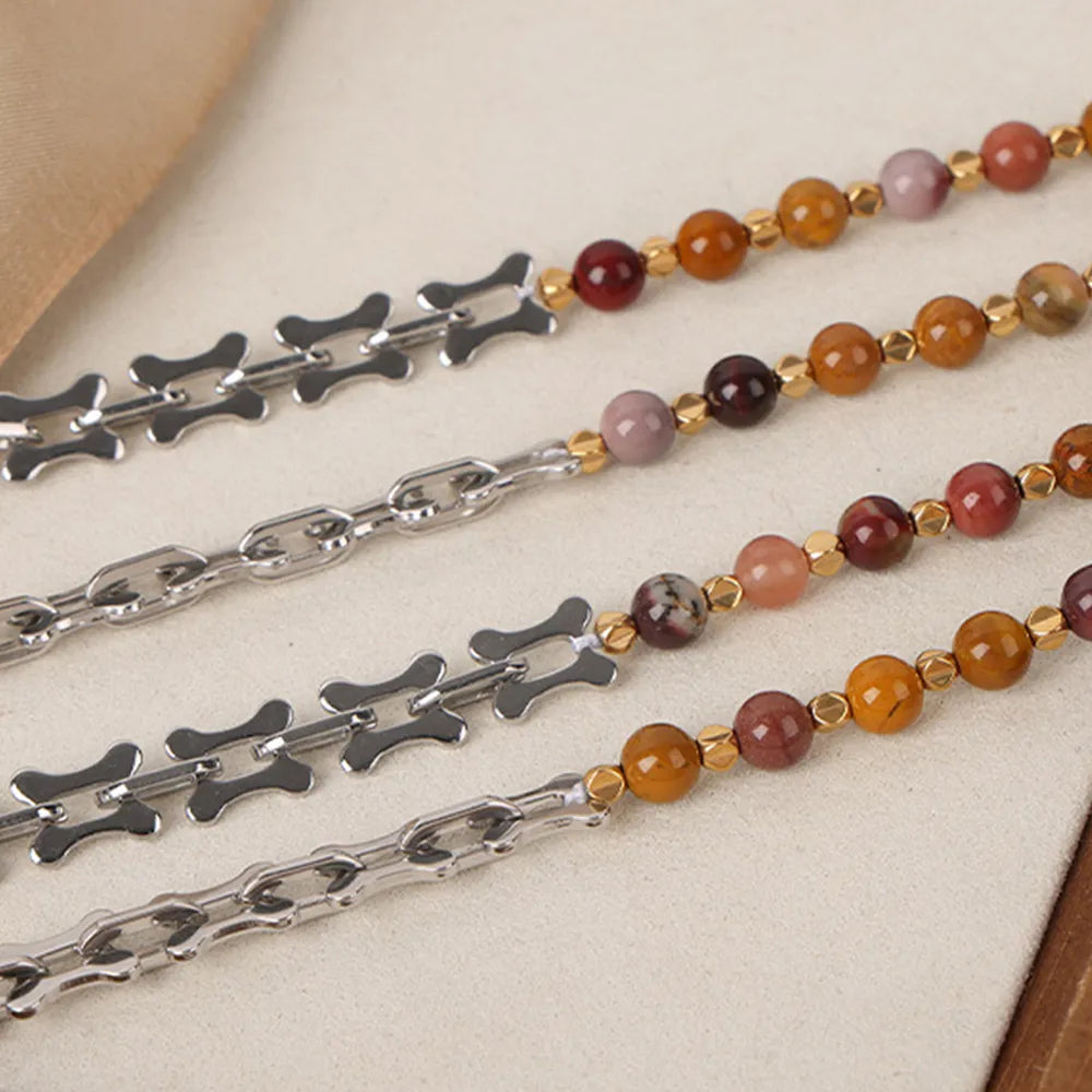 Beaded necklace with silver-tone chain, round multicolor stones, and link-style accents
