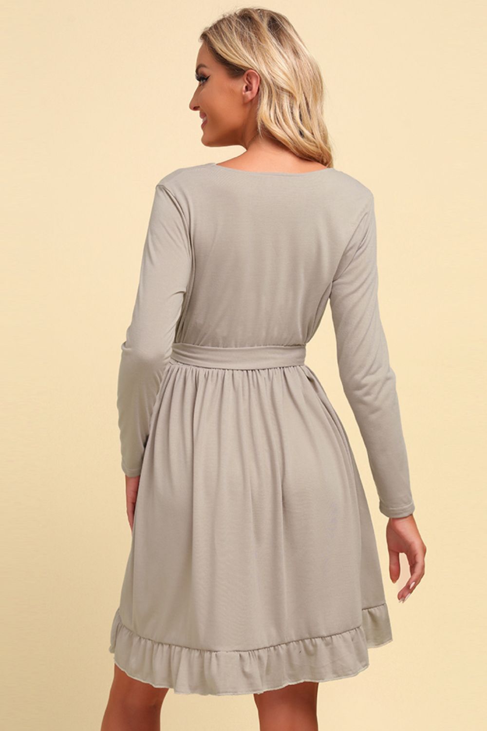 Long sleeve tie-waist ruffle hem dress, light gray viewed from back