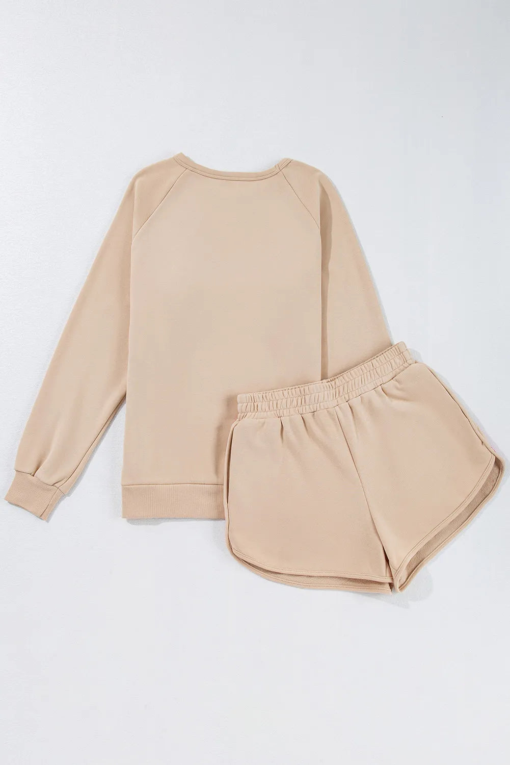 Round-neck top and shorts set in tan with matching rainbow stripe accents