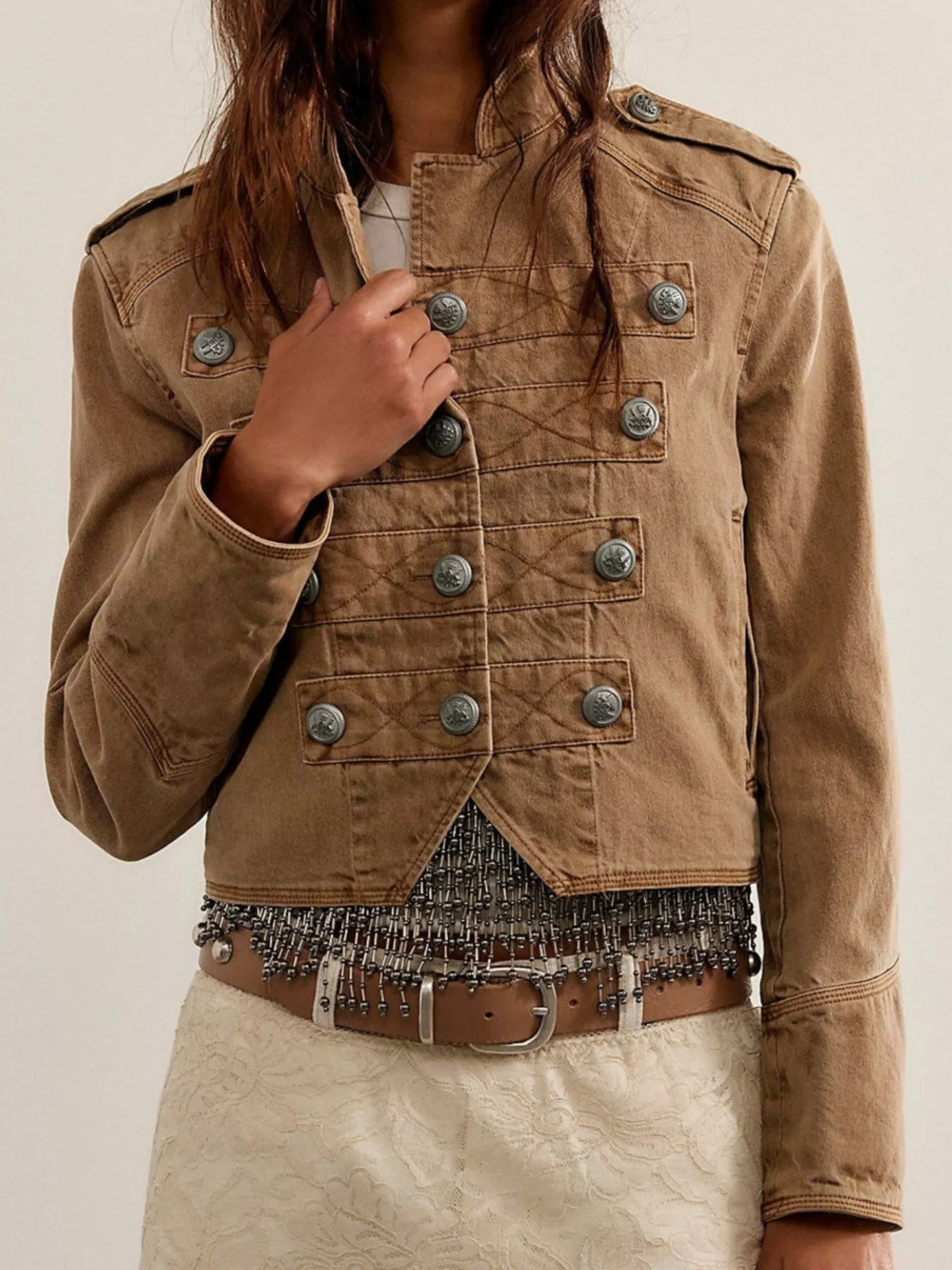 Cropped cotton jacket in khaki with button front, metal snaps, and chest patch pockets.