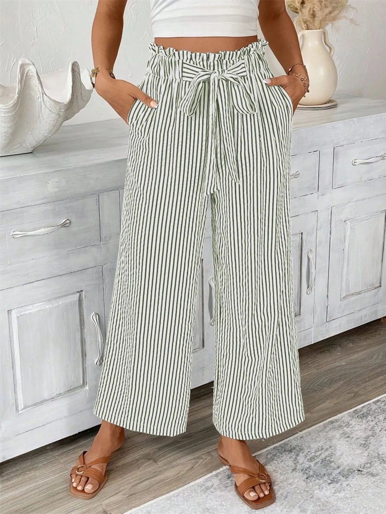 Striped wide-leg paper bag pants with tie waist, cream with thin dark vertical stripes