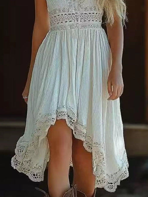 White lace cami dress with scalloped hem panels and layered asymmetrical skirt