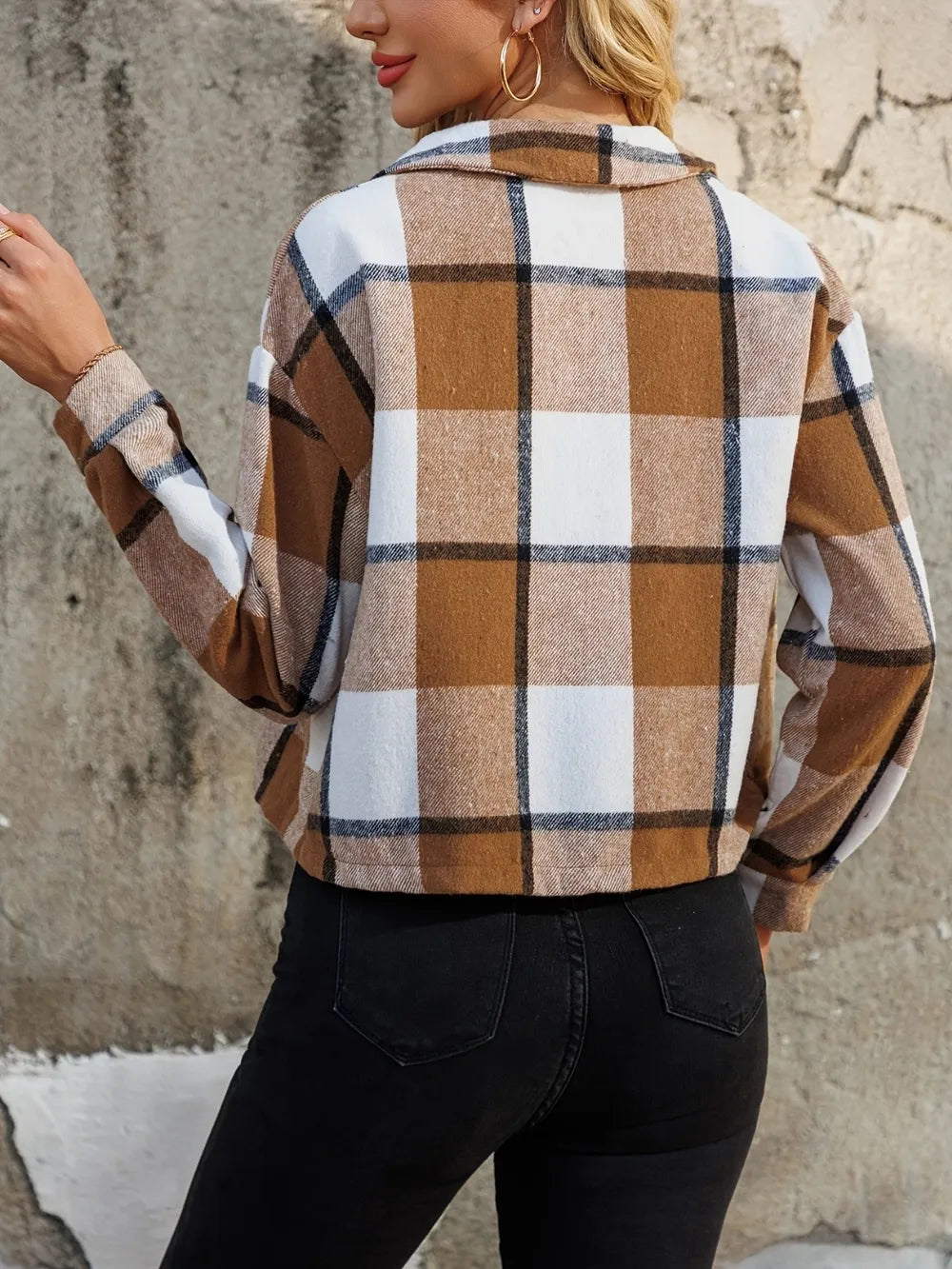 Back view of cropped plaid jacket with collar and square check pattern in caramel and white