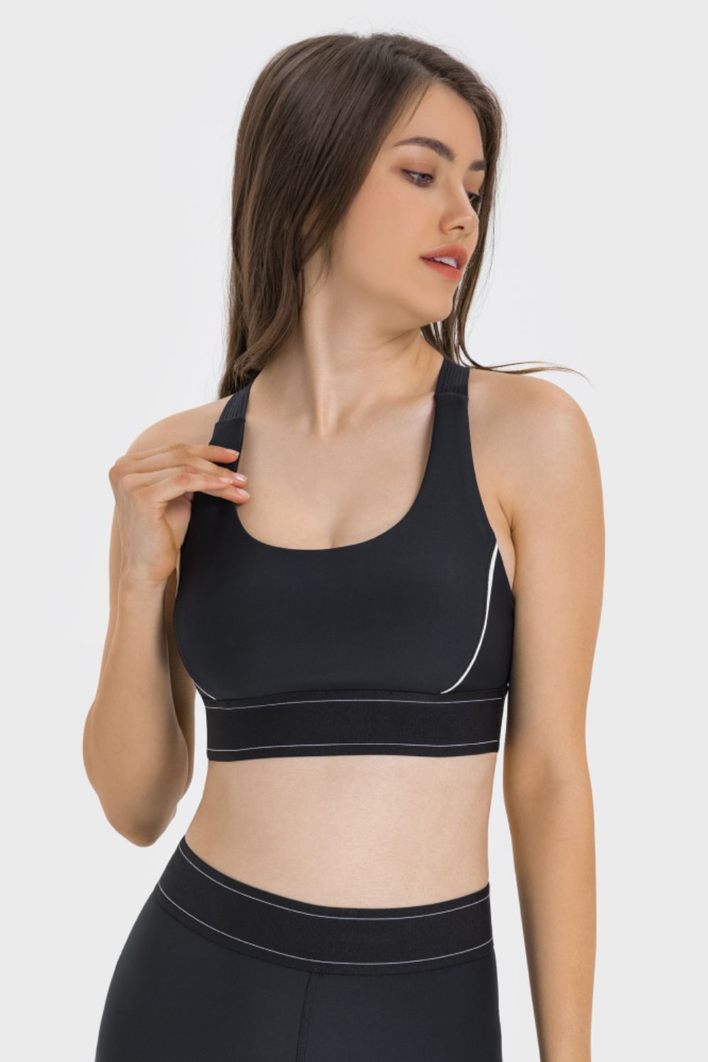 Black contrast sports bra with thin contrast trim and scoop neckline