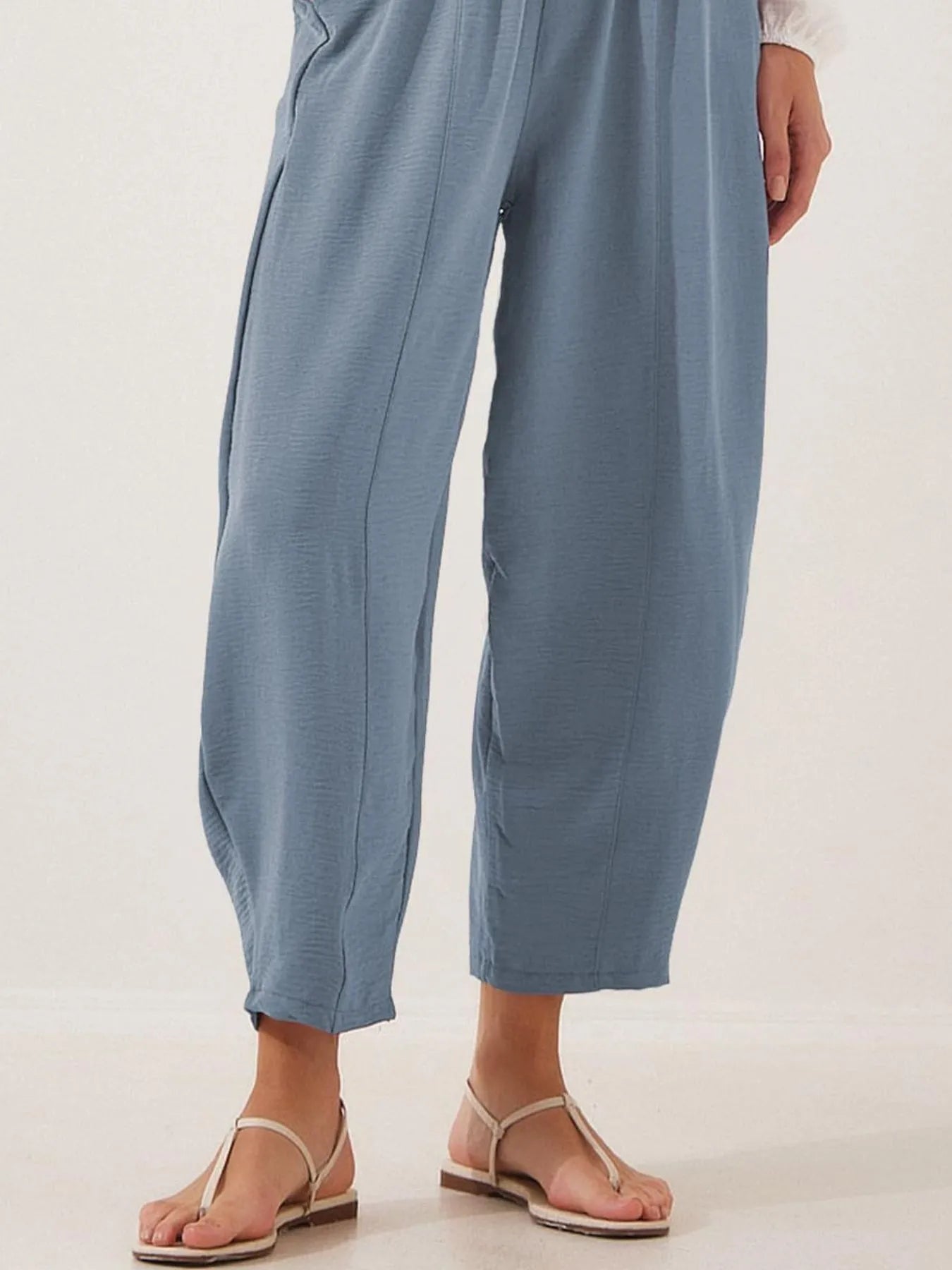 Powder blue drawstring wide-leg cropped pants with elastic waistband