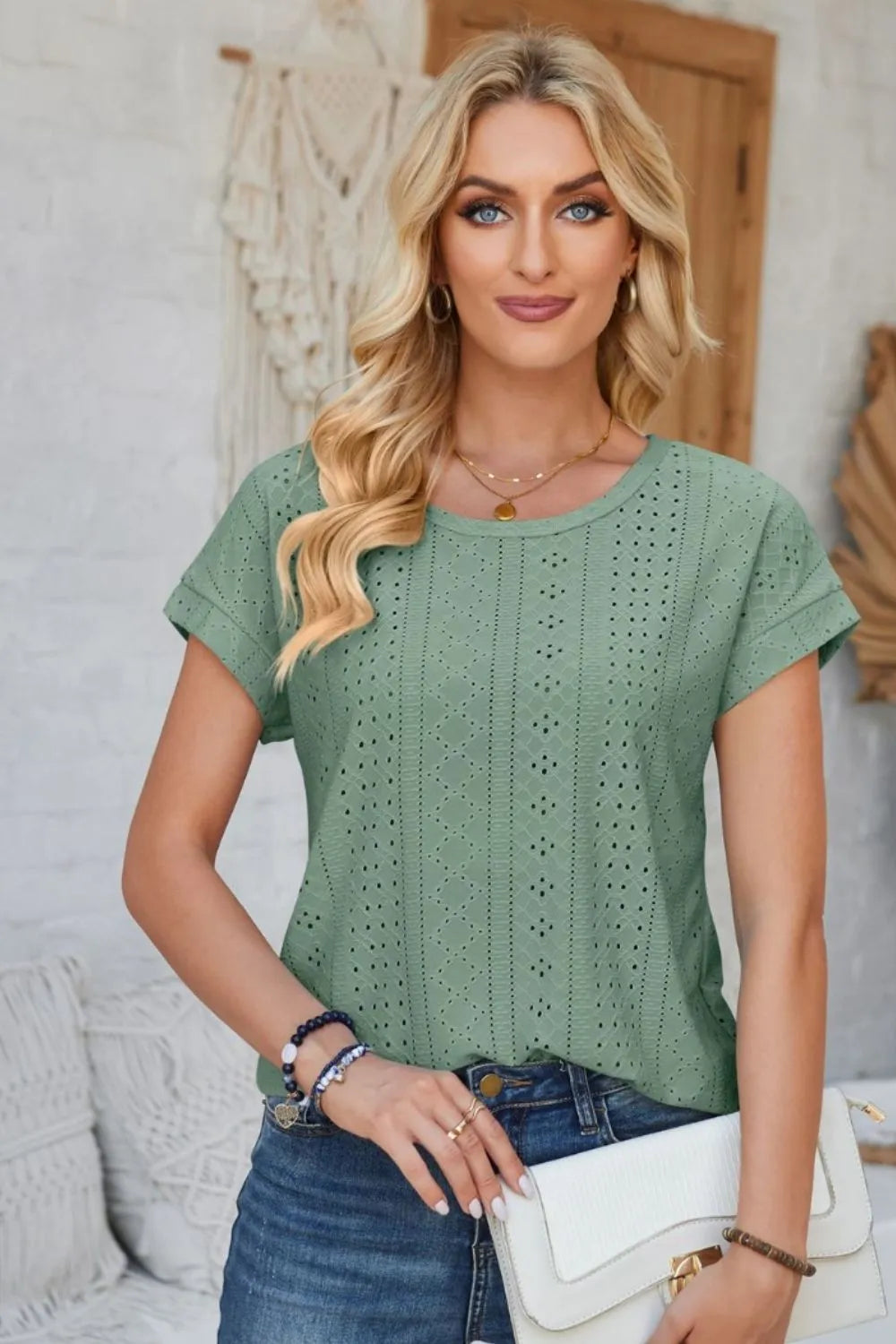 Sage green eyelet round-neck short-sleeve T-shirt with vertical cutout rows