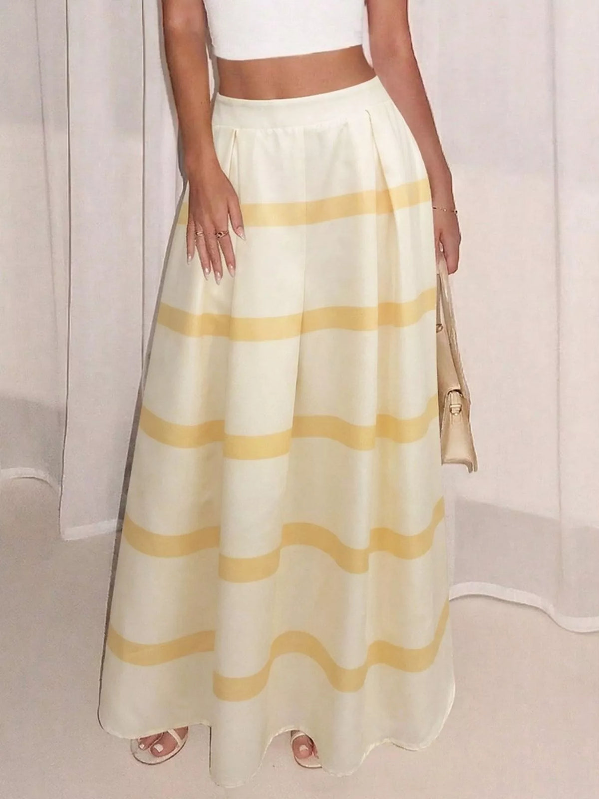 Yellow-striped white maxi skirt with elastic waistband and side pockets
