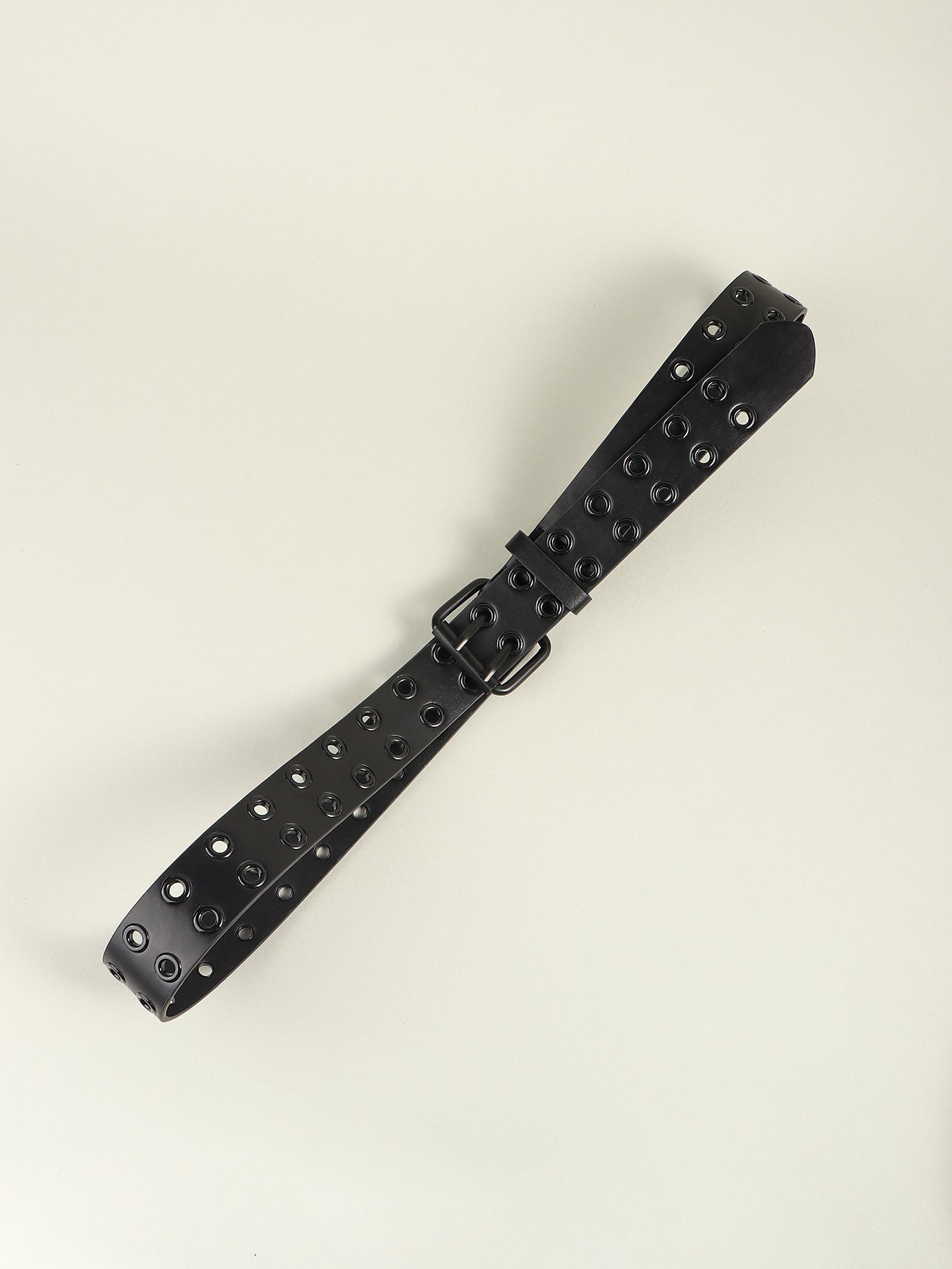 Black vegan leather grommet belt with square buckle and studded strap