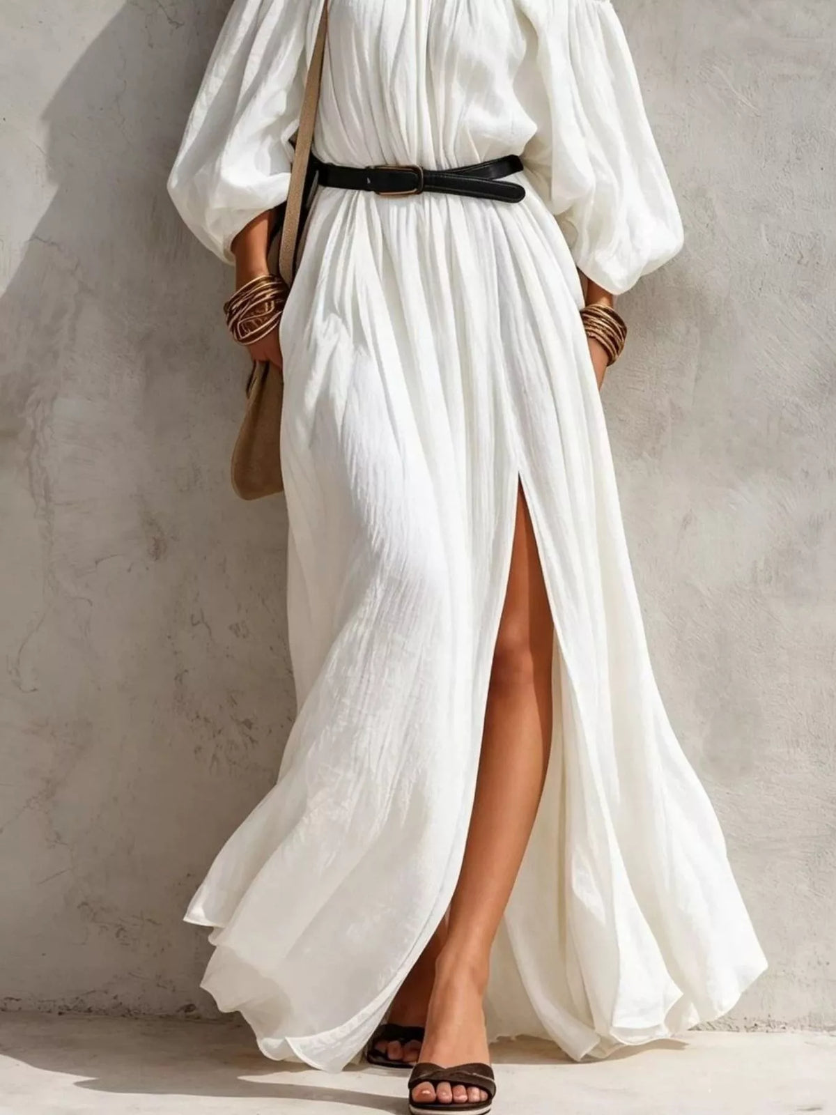 White off-shoulder belted maxi dress with flowing skirt and front side slit