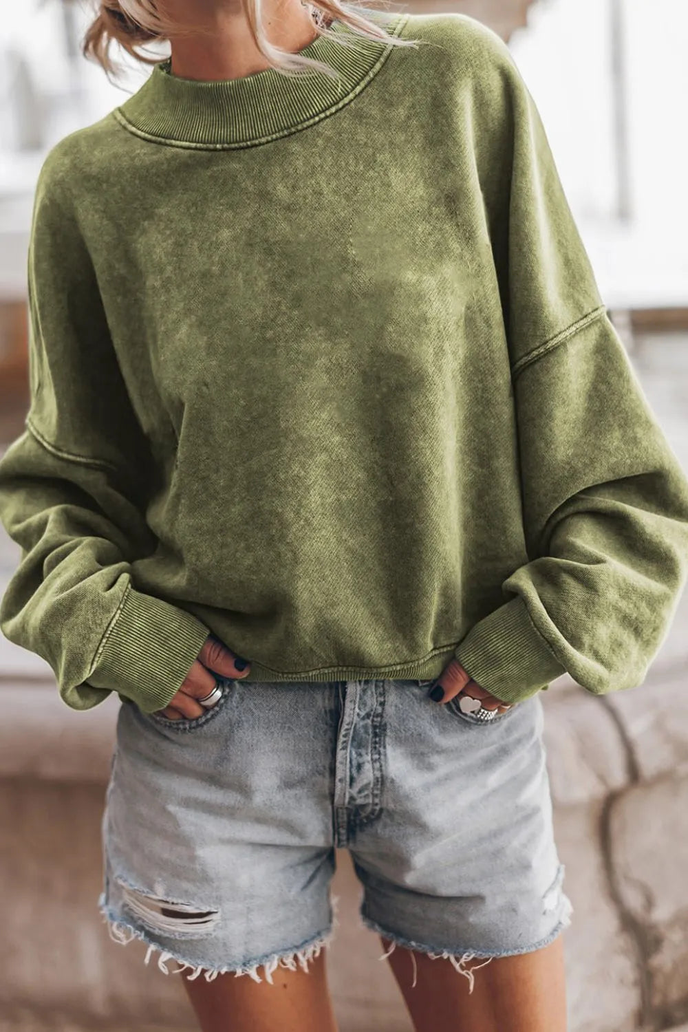 Moss green mock-neck dropped-shoulder sweatshirt with ribbed hem and cuffs