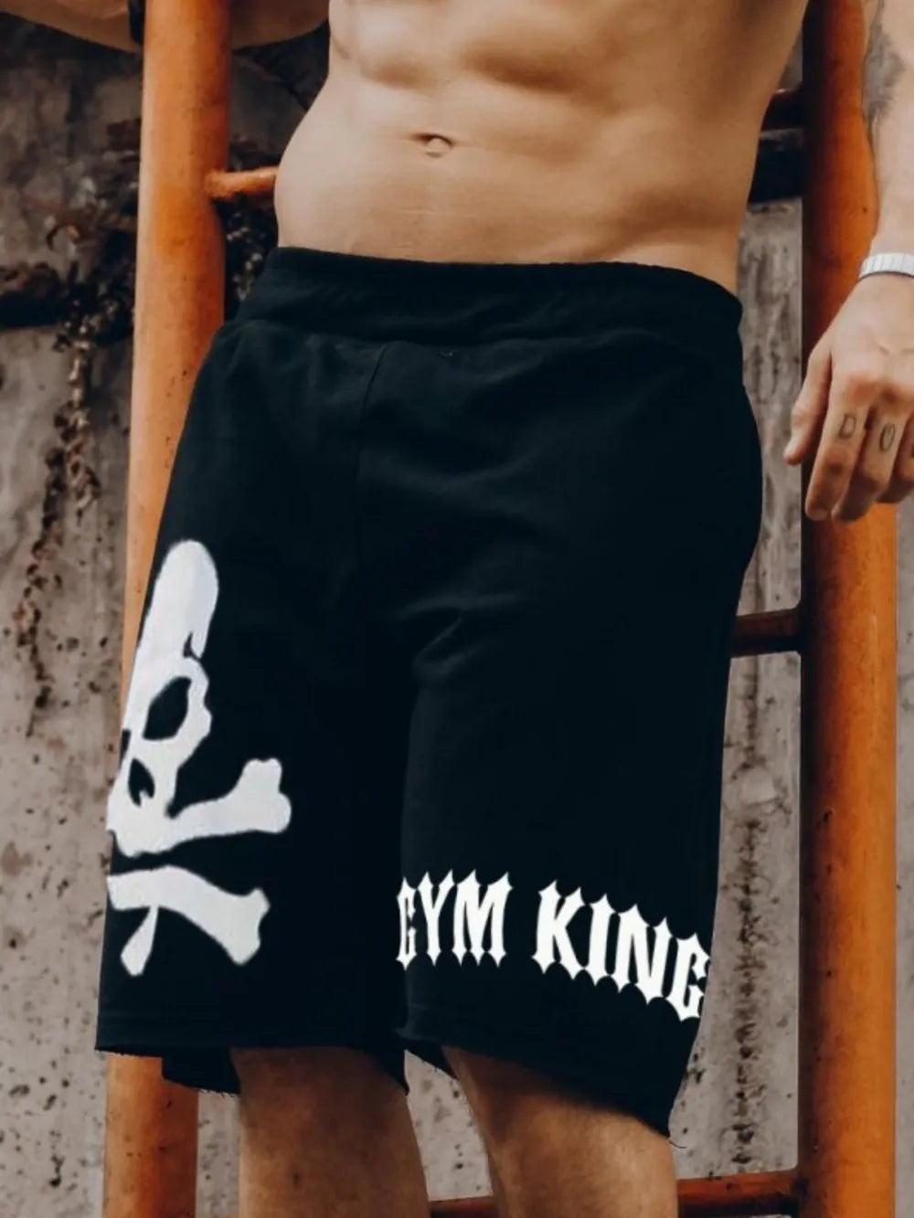 Skull drawstring shorts, black with large white skull graphic and GYM KIN text