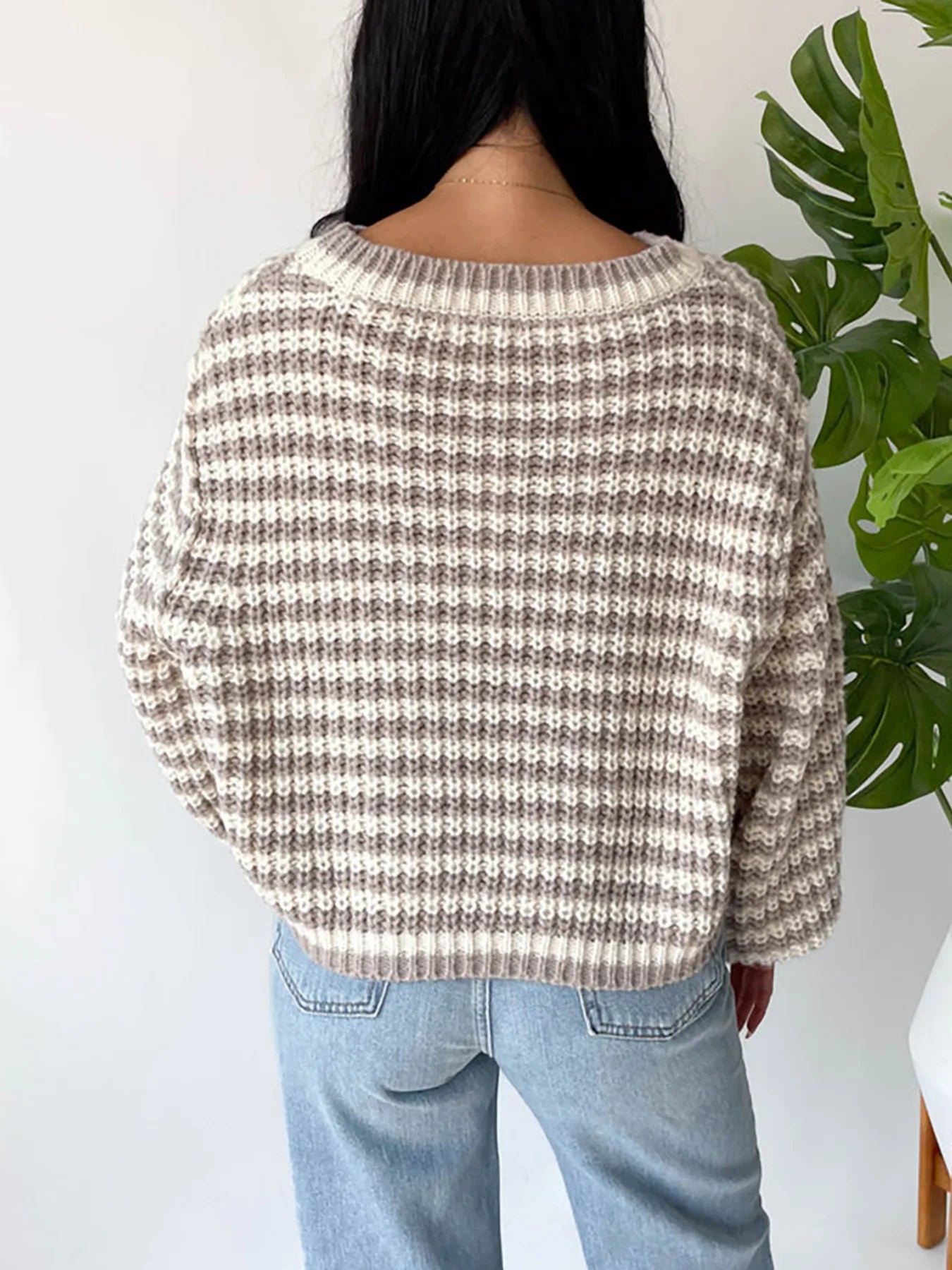 Oversized striped drop-shoulder sweater, back view, taupe with dark knit stripe pattern
