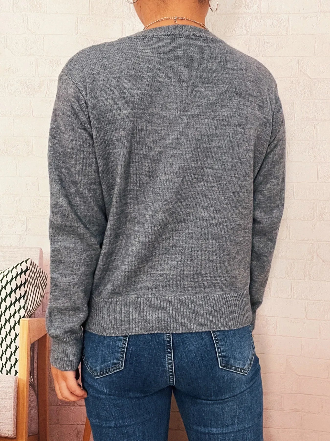 Heather gray button-up long sleeve cardigan, back view with ribbed cuffs and hem.