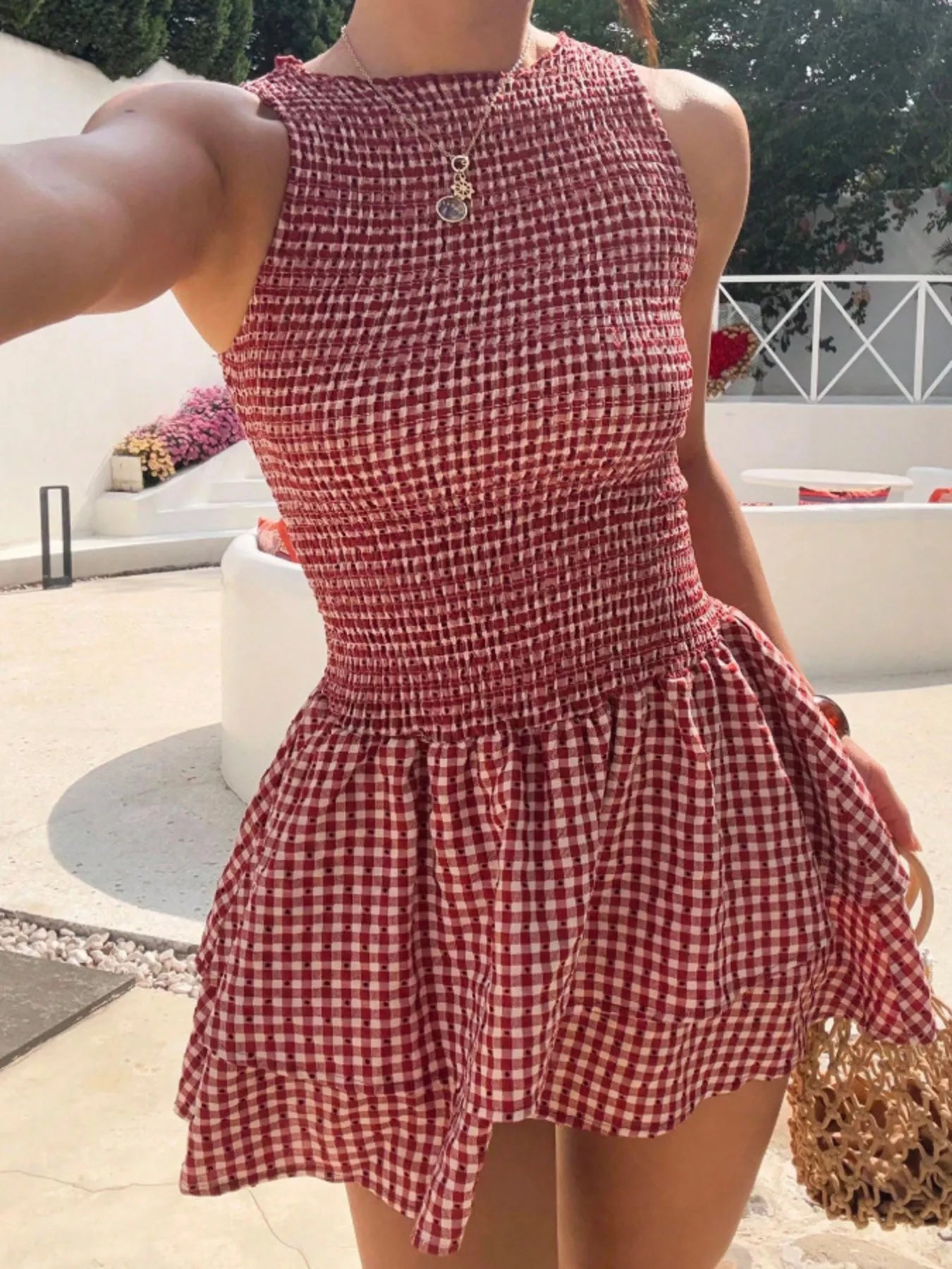Gingham smocked mini dress, red and white check, sleeveless with ruffle hem by Trendsi