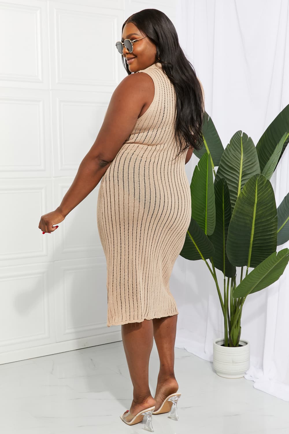 Tan sleeveless knit cover-up dress with V-neck and vertical openwork texture, side view