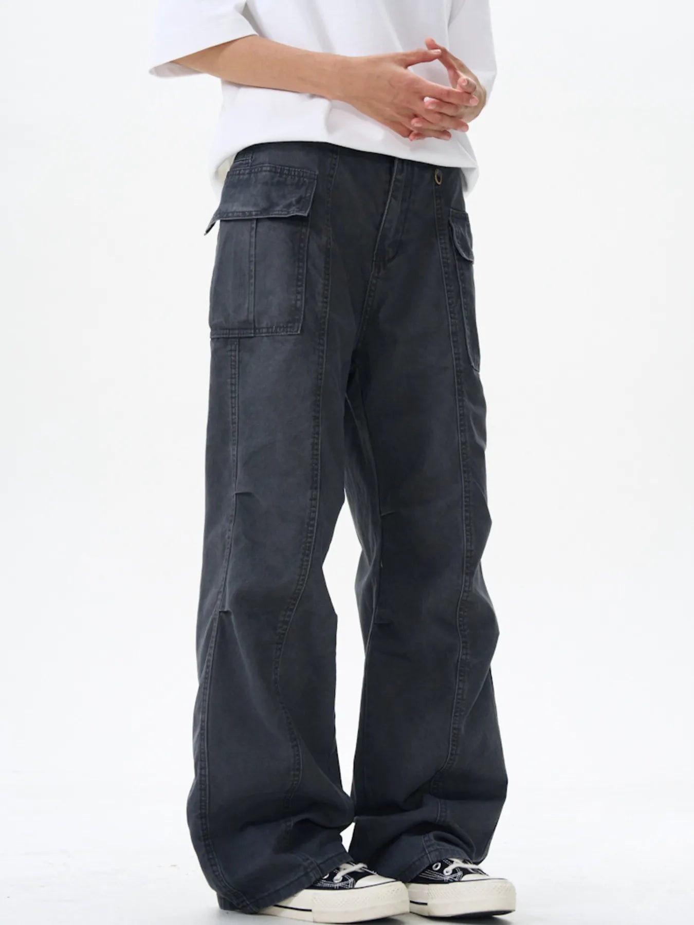 Wide leg cargo pants, dark gray with front cargo pockets and gold buttons