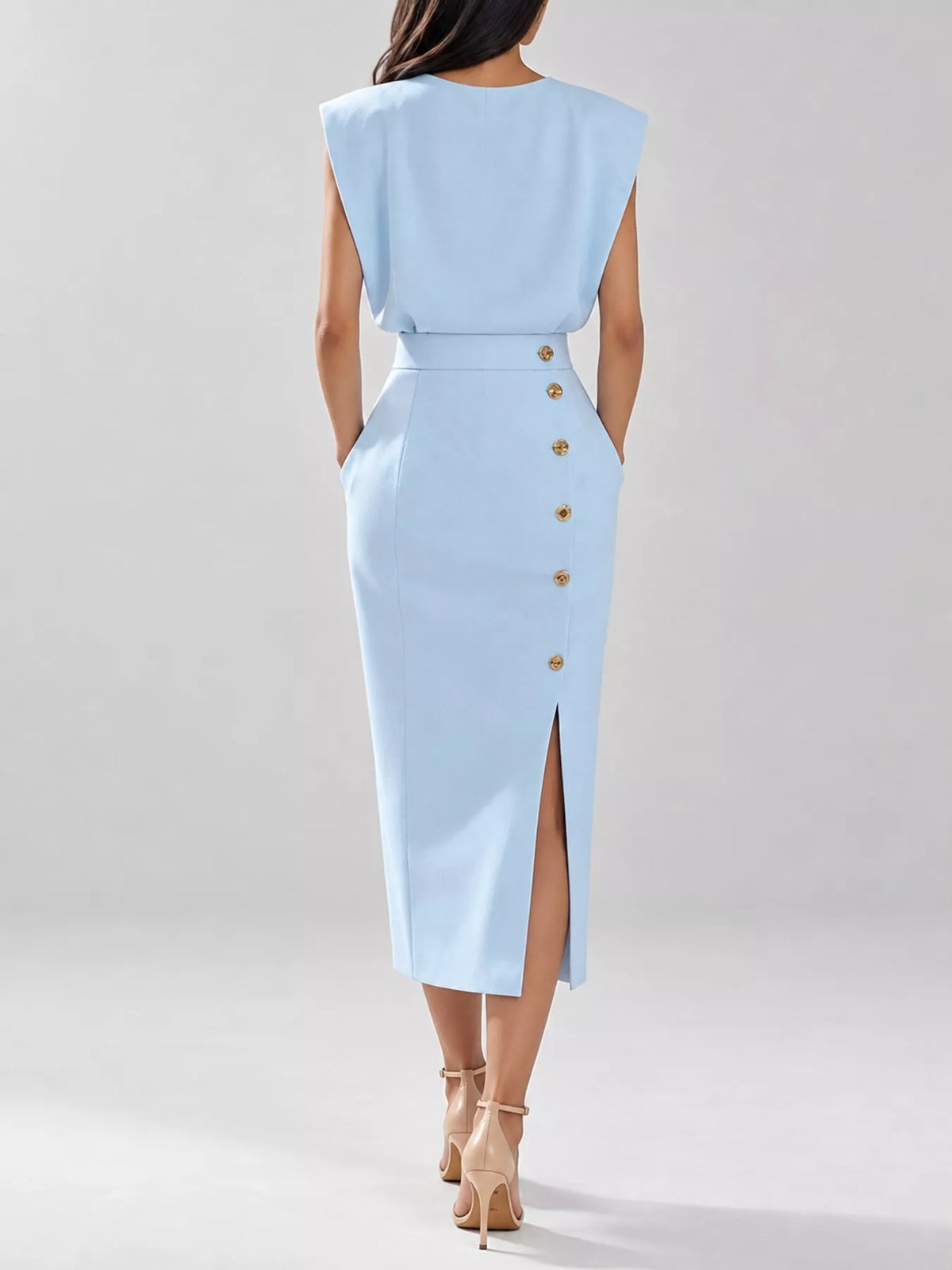 Light blue sleeveless midi dress back view with gold buttons at waist seam