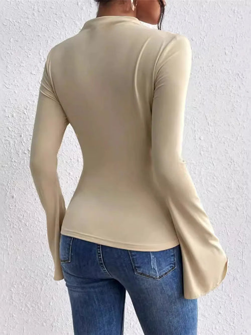 Beige fitted mock-neck t-shirt with ruched back and flared bell sleeves