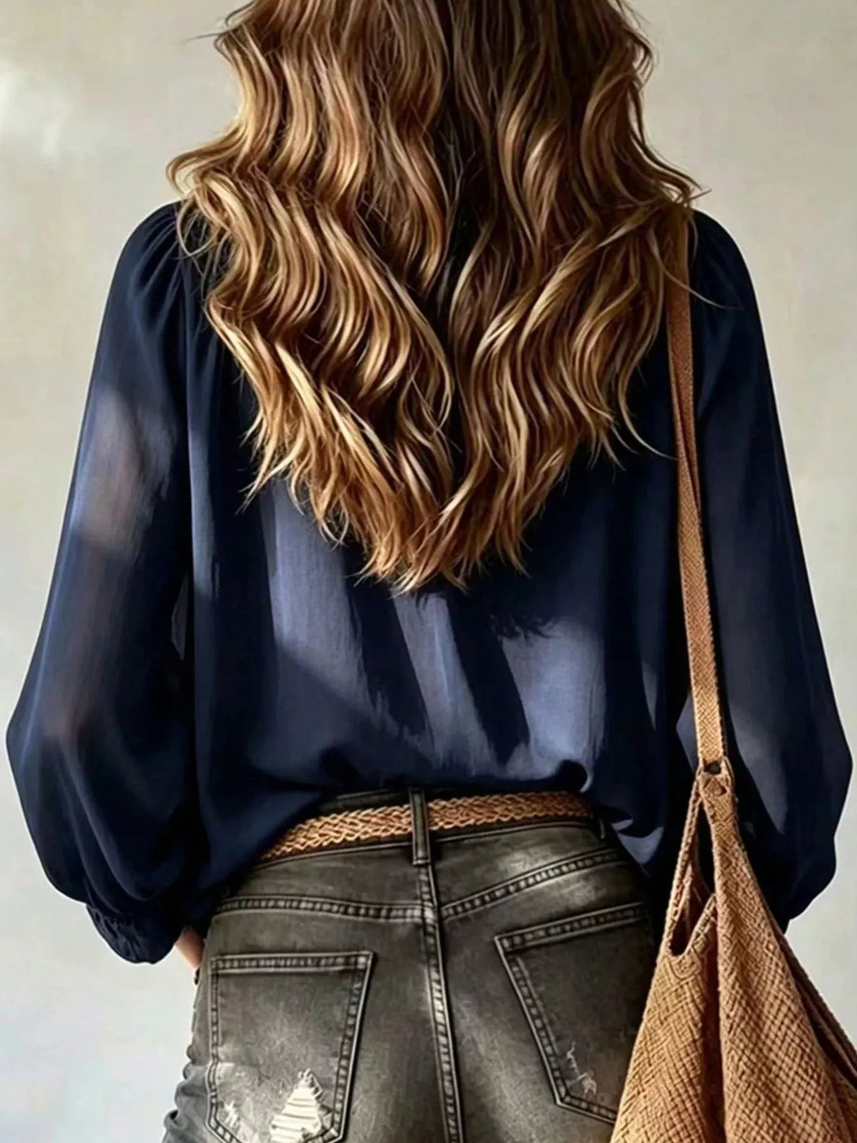 Dark blue ruffle V-neck front-tie blouse top, back view with long sleeves