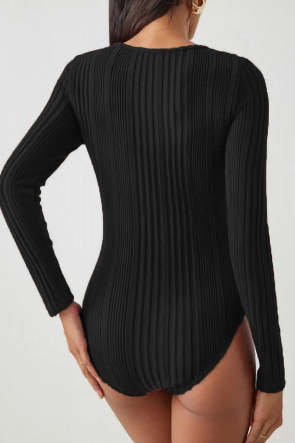 Black ribbed knit bodysuit, long sleeves, scoop back and seamless legs