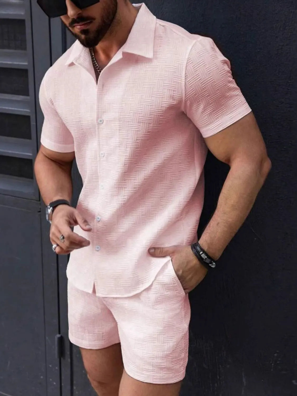 Blush pink short-sleeve button-up shirt and matching shorts set with open collar