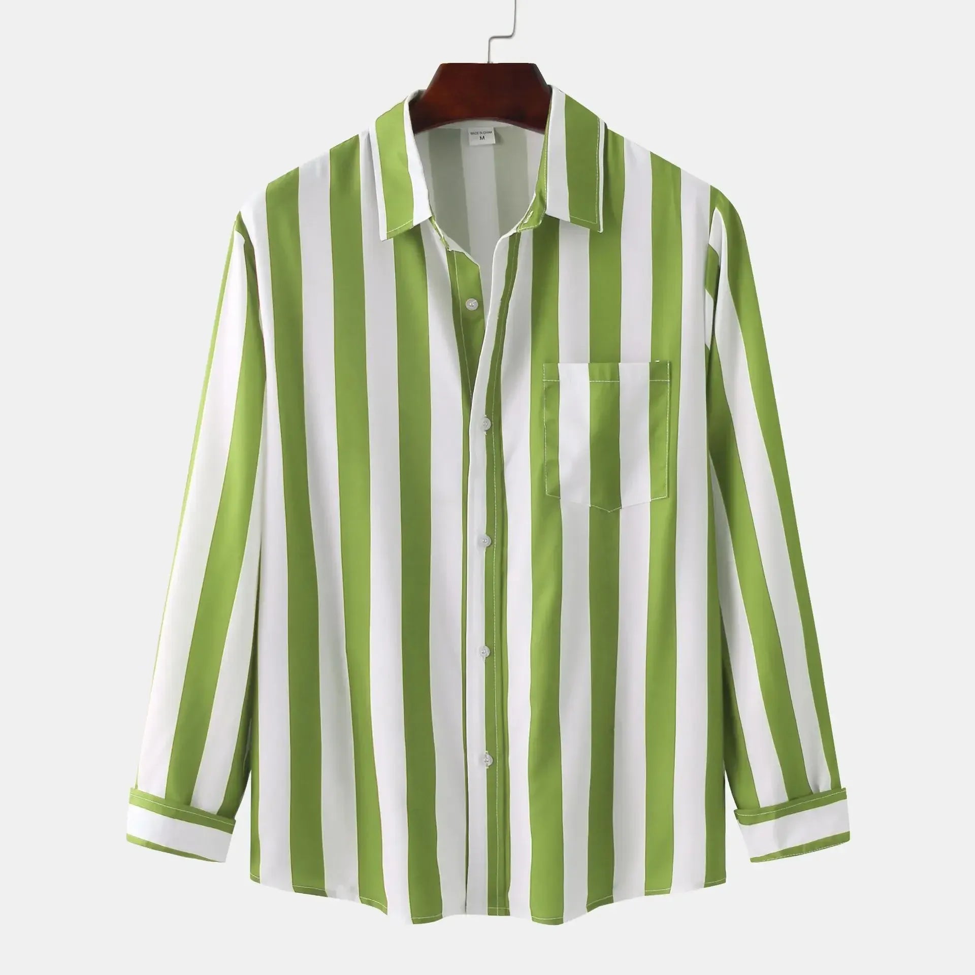 Green striped long-sleeve button-down shirt on hanger, button front and chest pocket