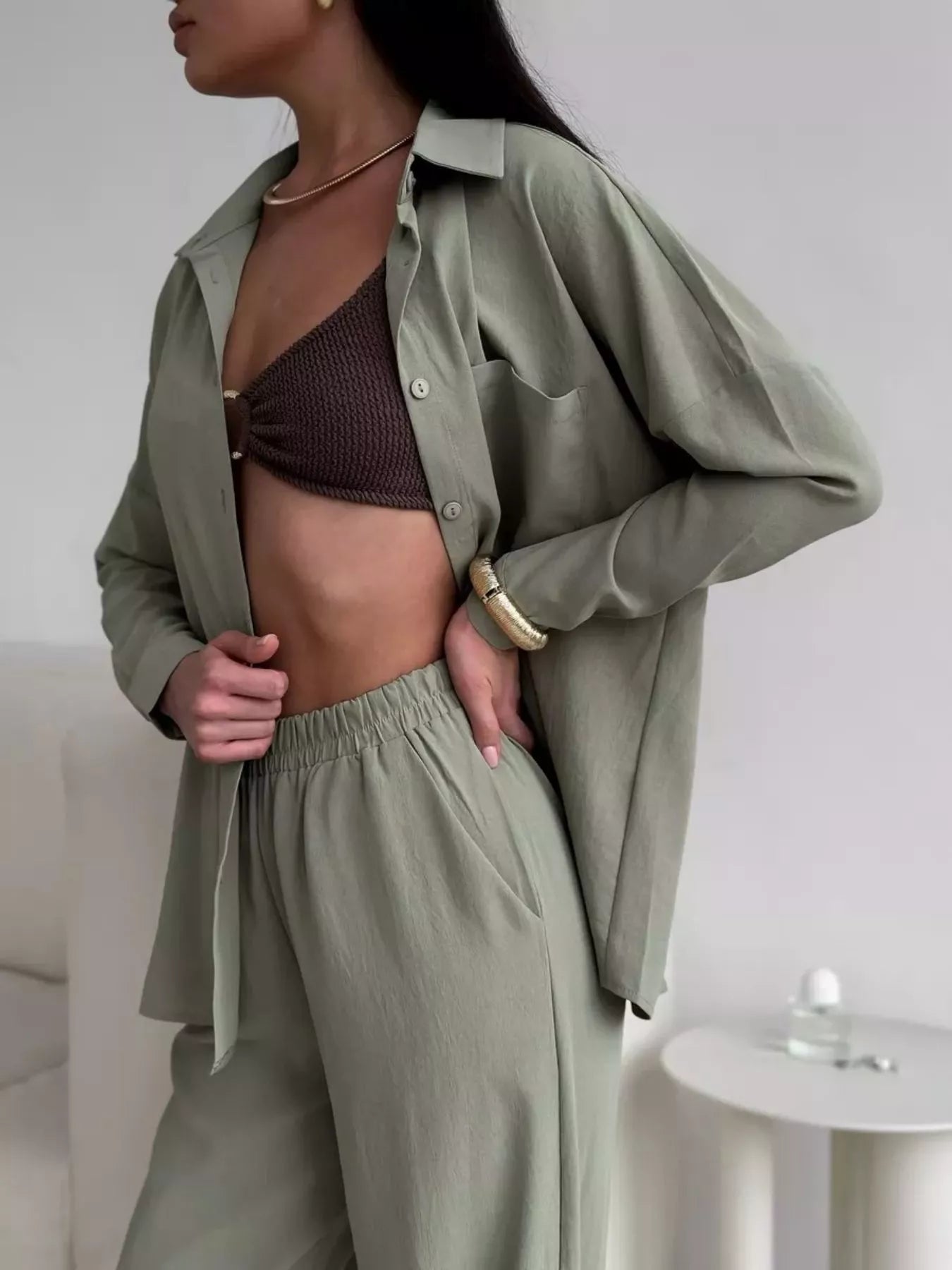 Sage green relaxed-fit shirt and wide-leg pants set with elastic waist pants