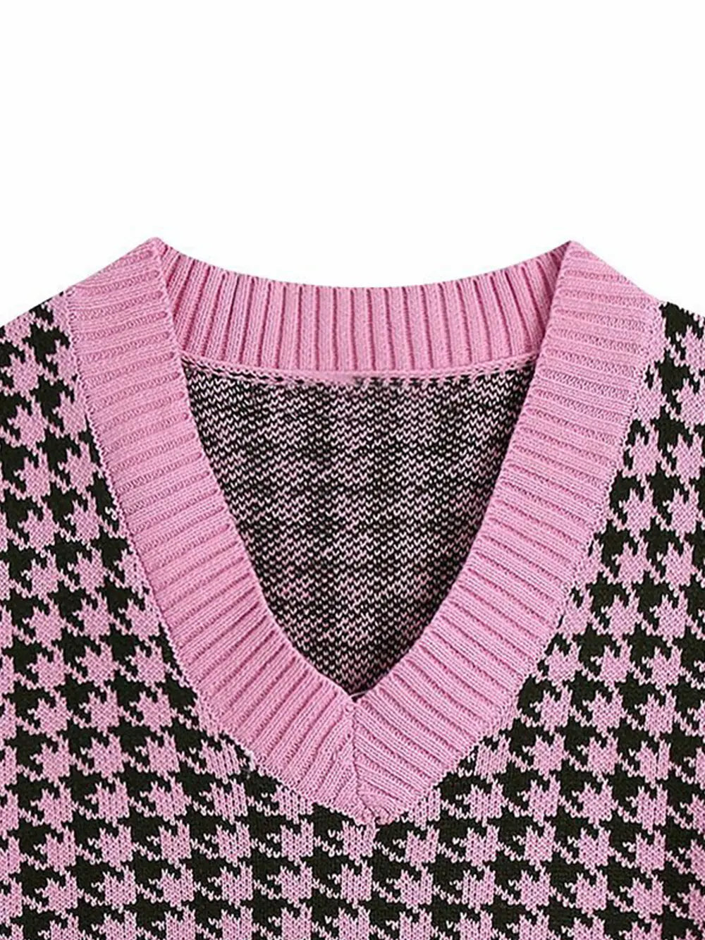 Pink-and-black houndstooth V-neck sweater vest with ribbed neckline