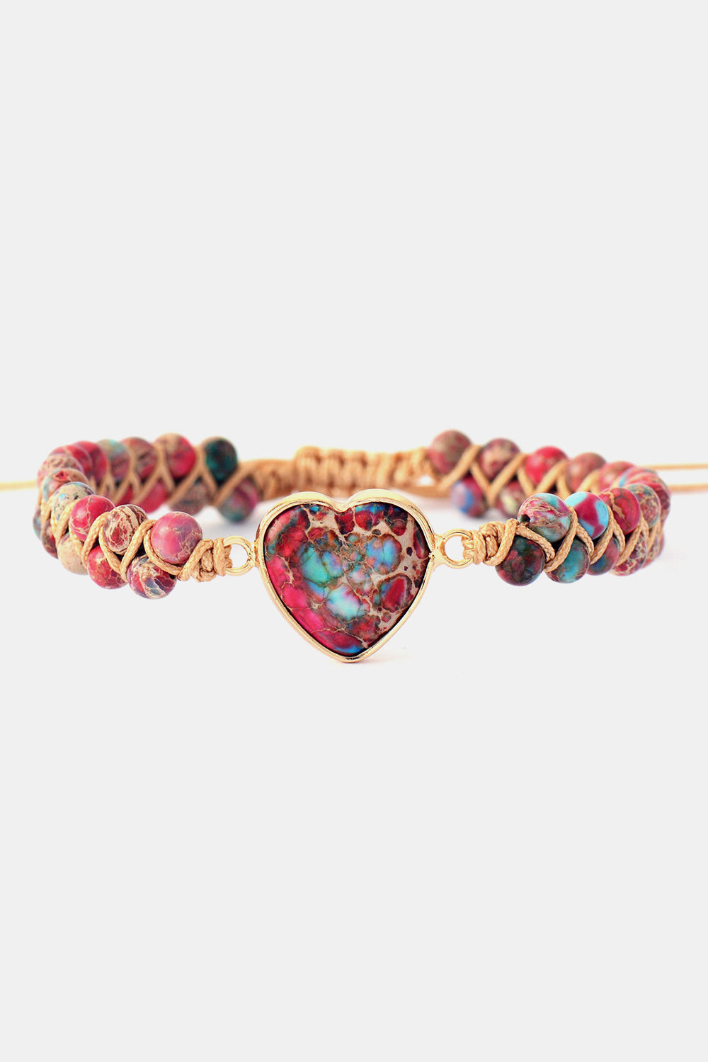 Beaded braided heart bracelet with multicolor stones and gold heart centerpiece pendant