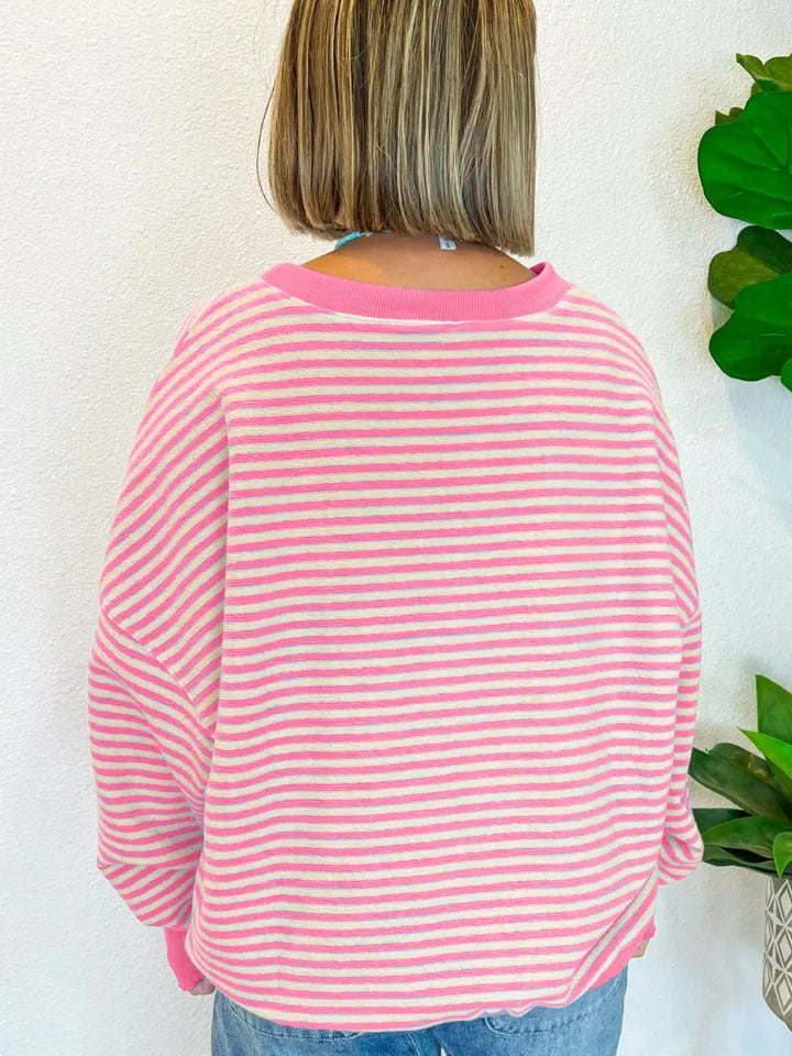 Pink and white striped sweatshirt, round neck long sleeves with back view