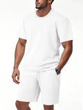 Textured white men's round-neck short-sleeve top and matching shorts set