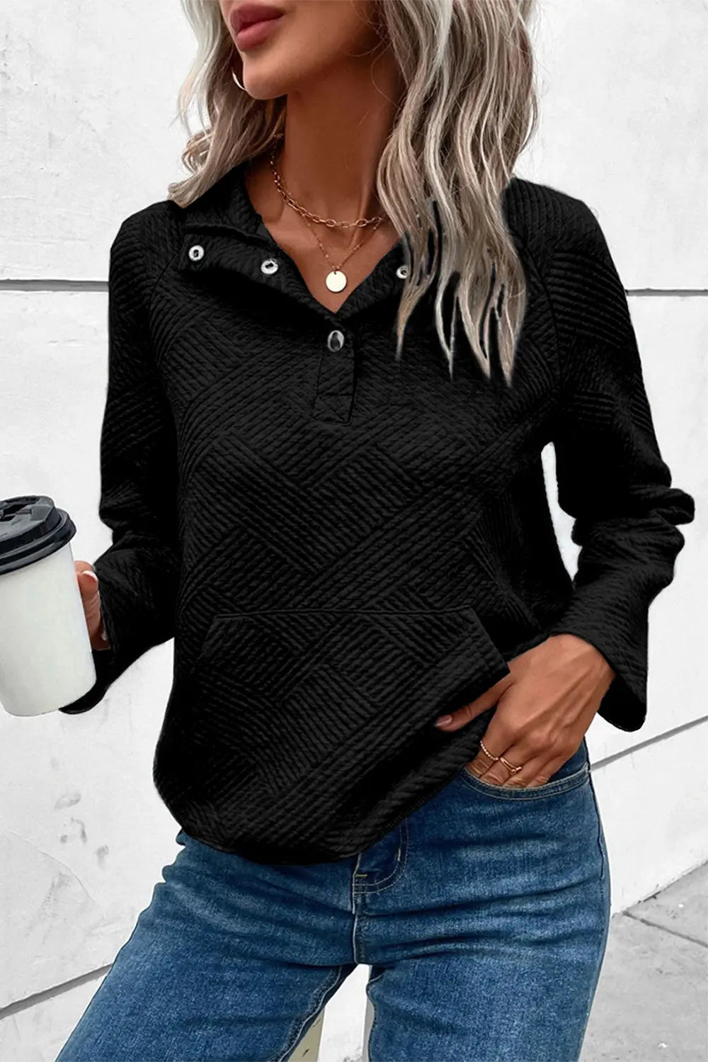 Black snap-button long-sleeve sweatshirt with geometric diamond-textured pattern