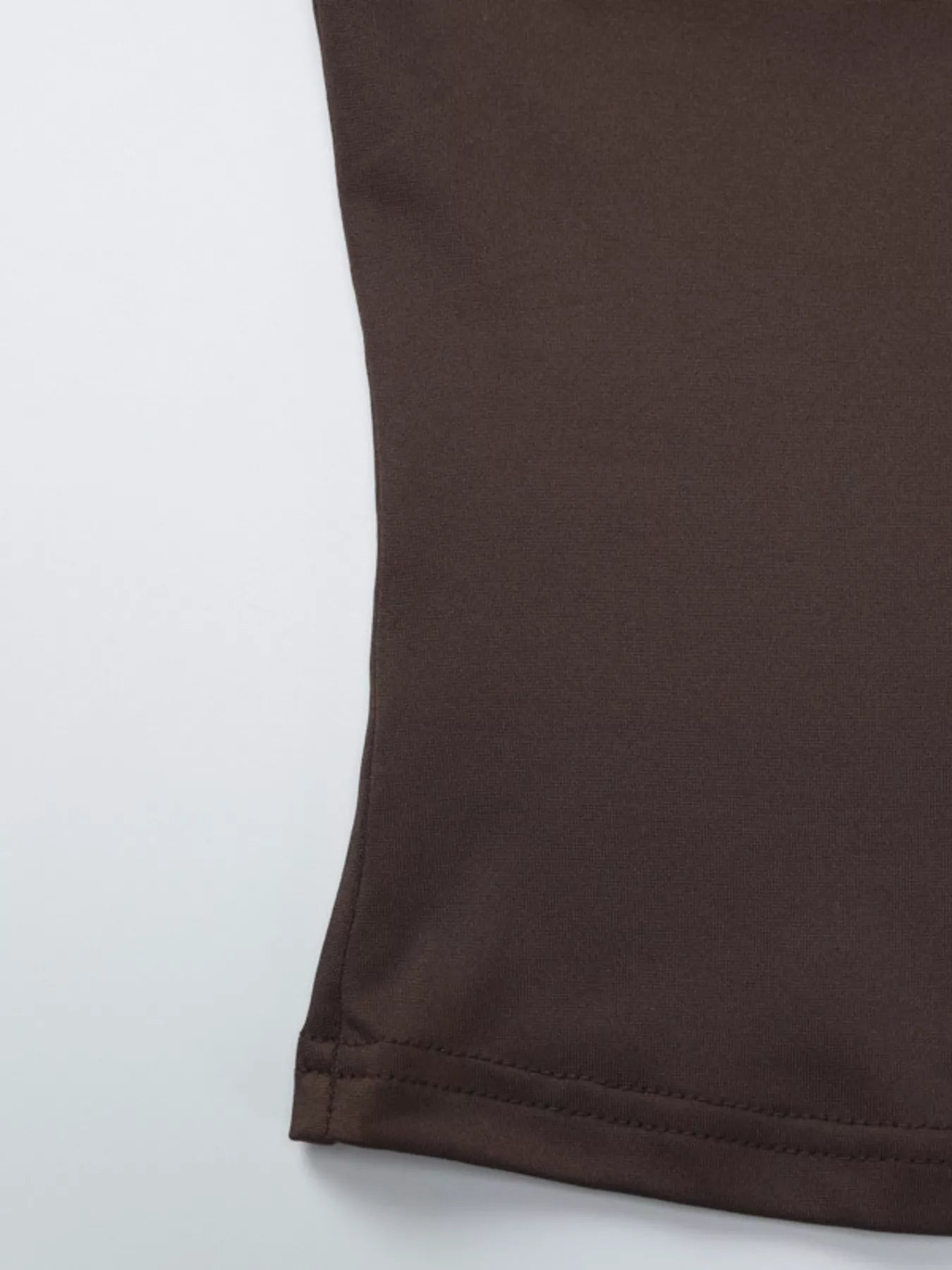 Dark brown crop top side seam and stitched lower hem