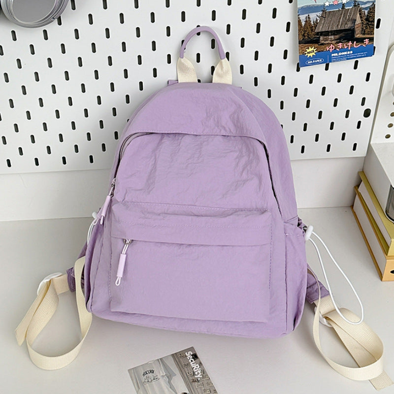 Cedar & Moore Casual Lightweight Drawstring Backpack in lavender with cream straps and front pocket by Trendsi, medium