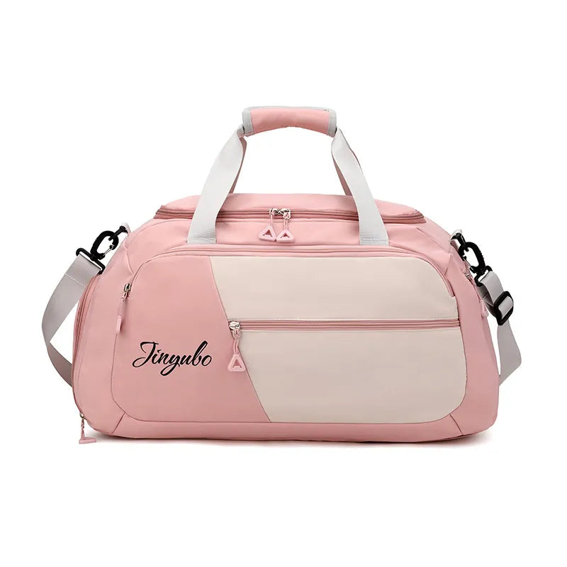 Large nylon travel duffel bag in dusty pink with contrast off-white panel and handles