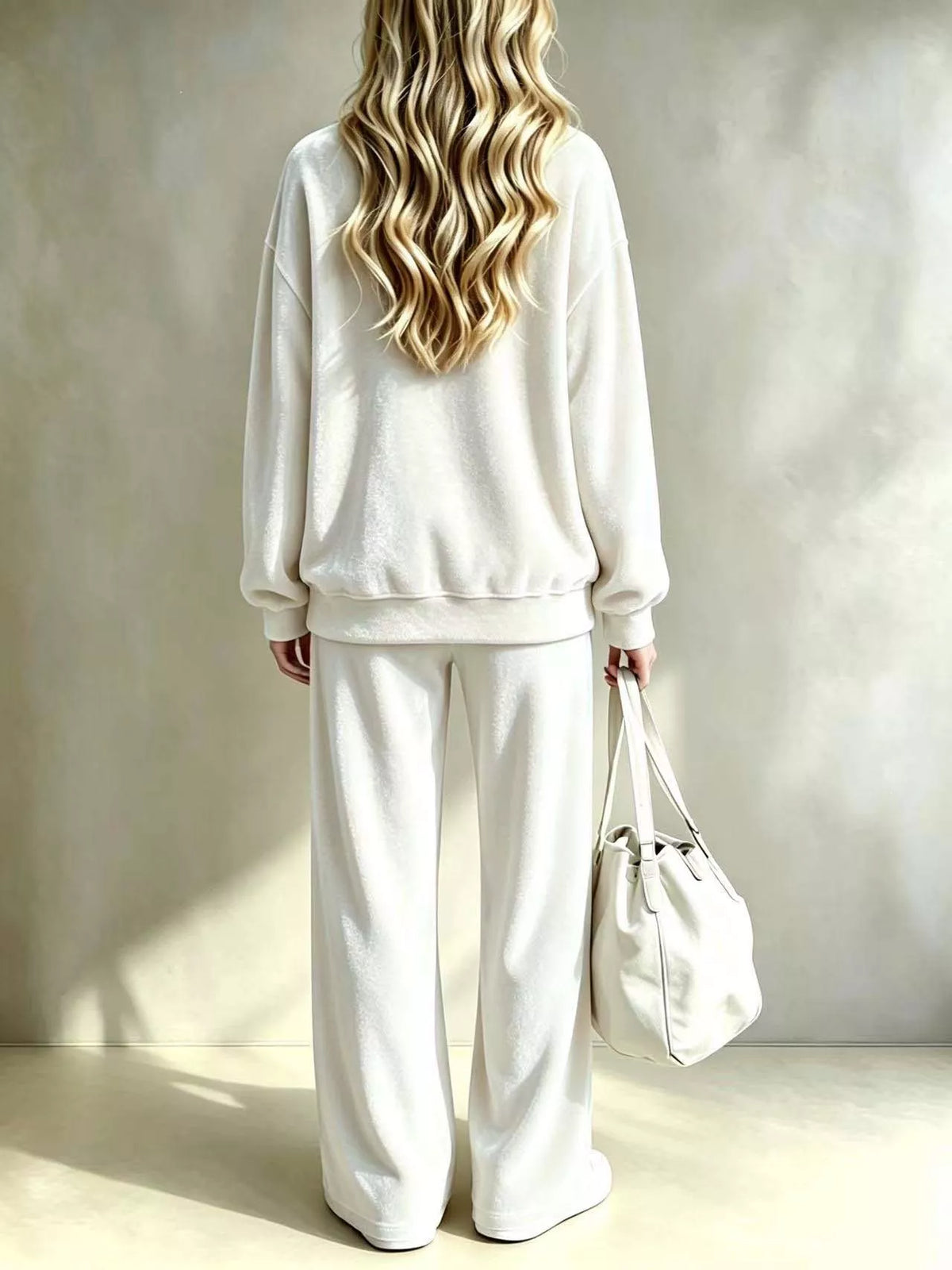 White velvet two-piece set with long-sleeve sweatshirt and wide-leg pants