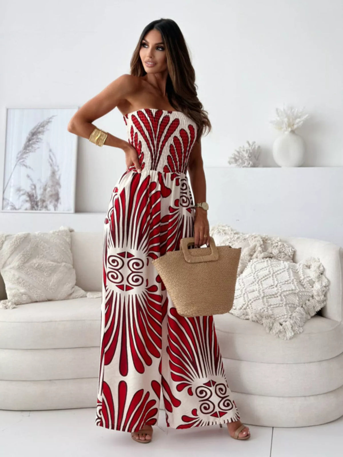 Strapless wide-leg jumpsuit with red and white abstract fan print