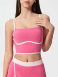 Fuchsia pink active cami with square neckline, contrast white trim, and molded chest pads