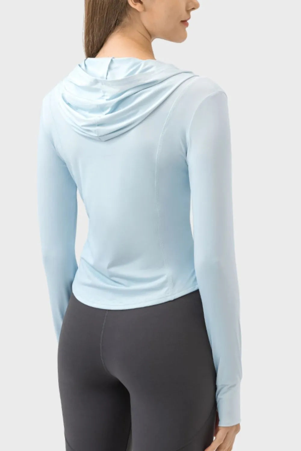 Light blue zip-up hooded long sleeve jacket with kangaroo pocket, side back view
