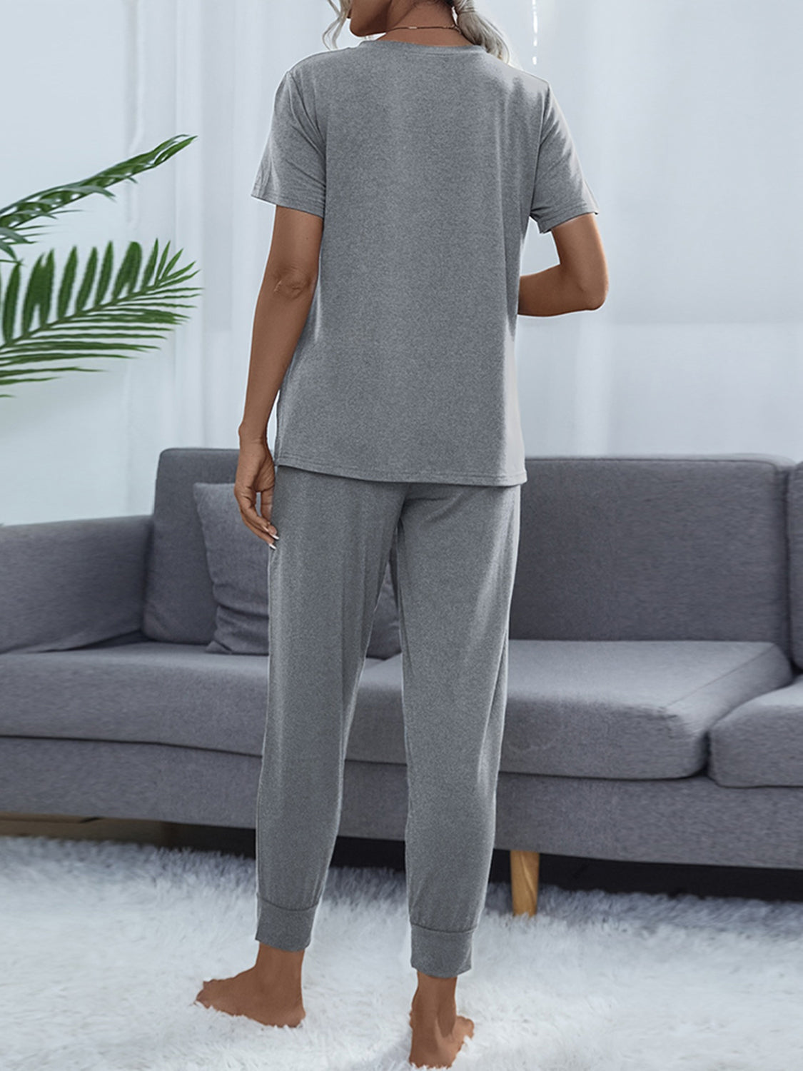 Light gray round-neck short-sleeve top and jogger pants set, back view, drawstring waist
