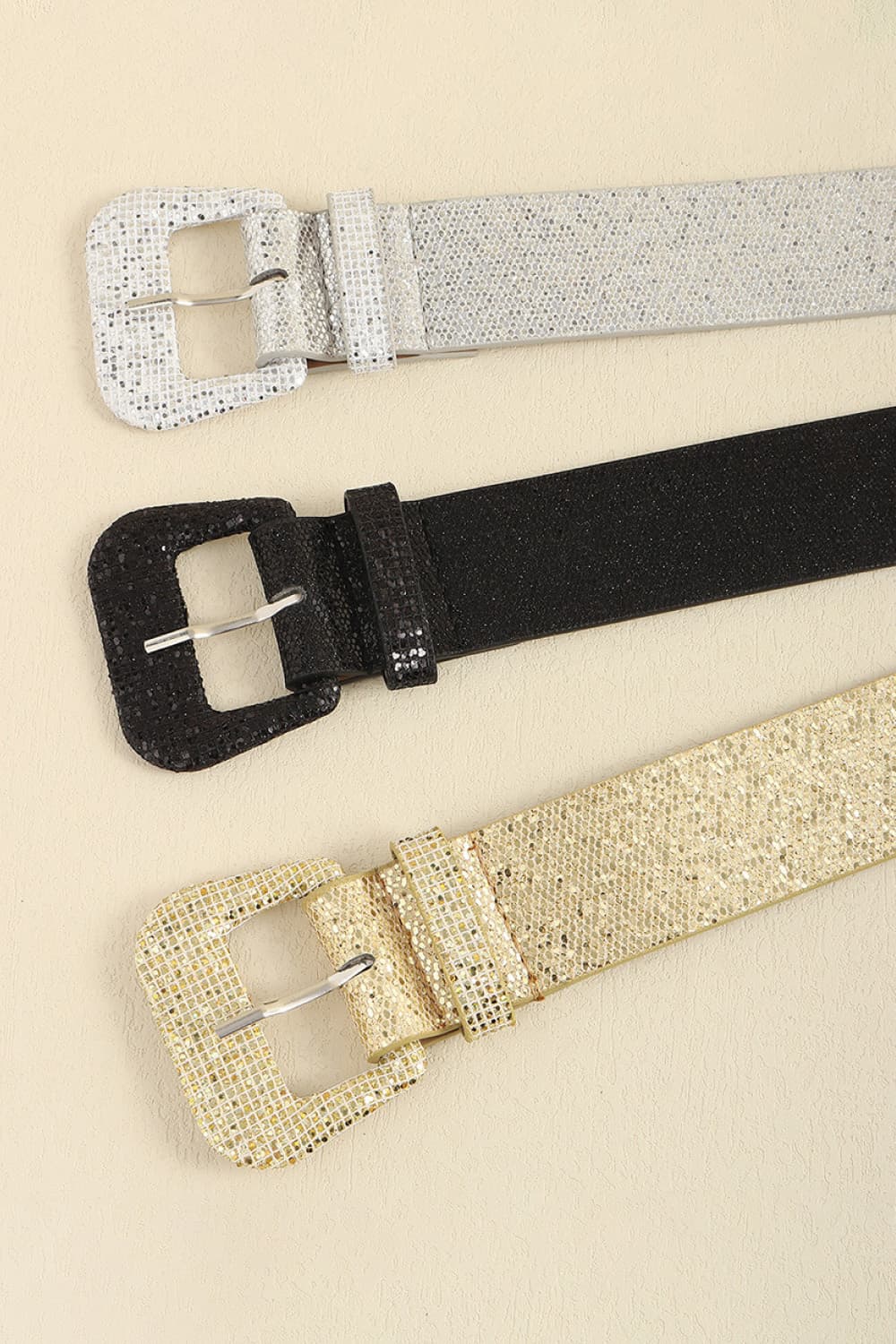 Glitter vegan leather belt set in black, gold, and white with buckles