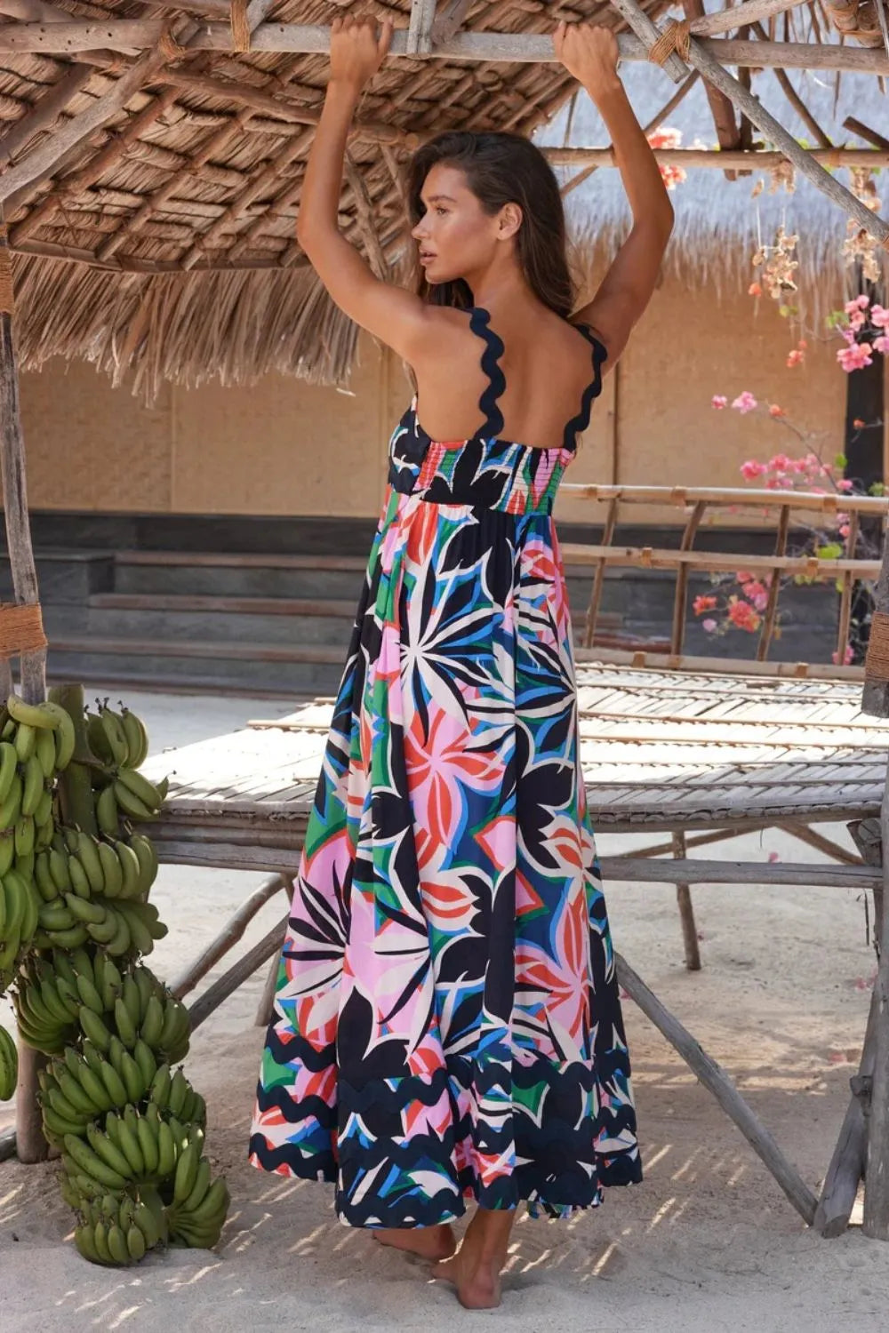 Square-neck wide-strap dress with multicolor floral print and tiered maxi length